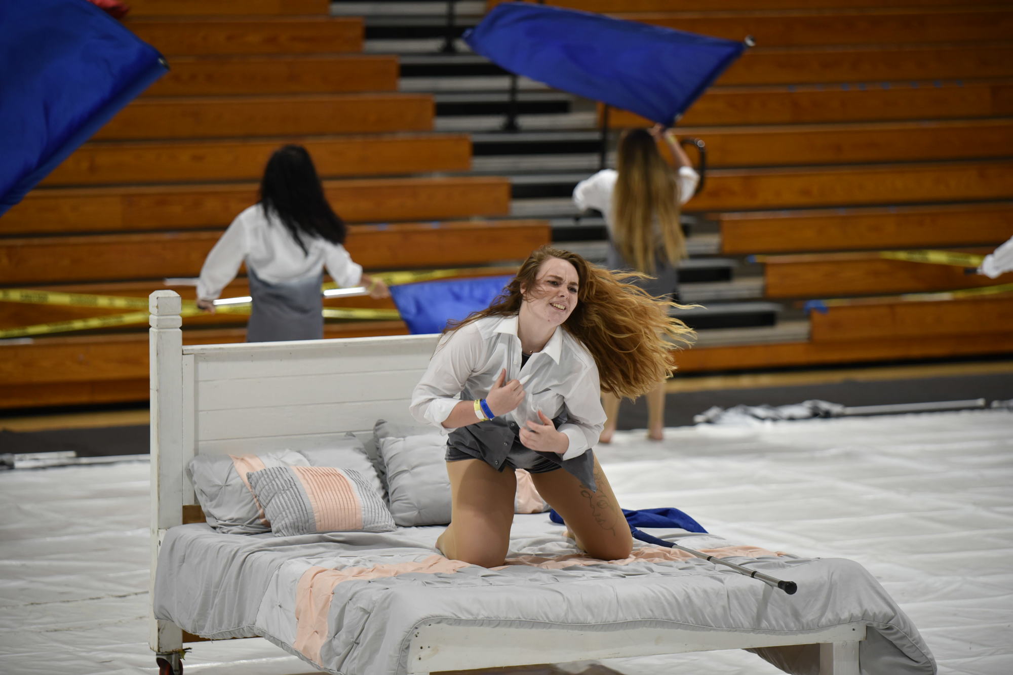 Emily Taylor, a senior in Braden River High School's varsity winter guard, uses the bed as part of the guard's 
