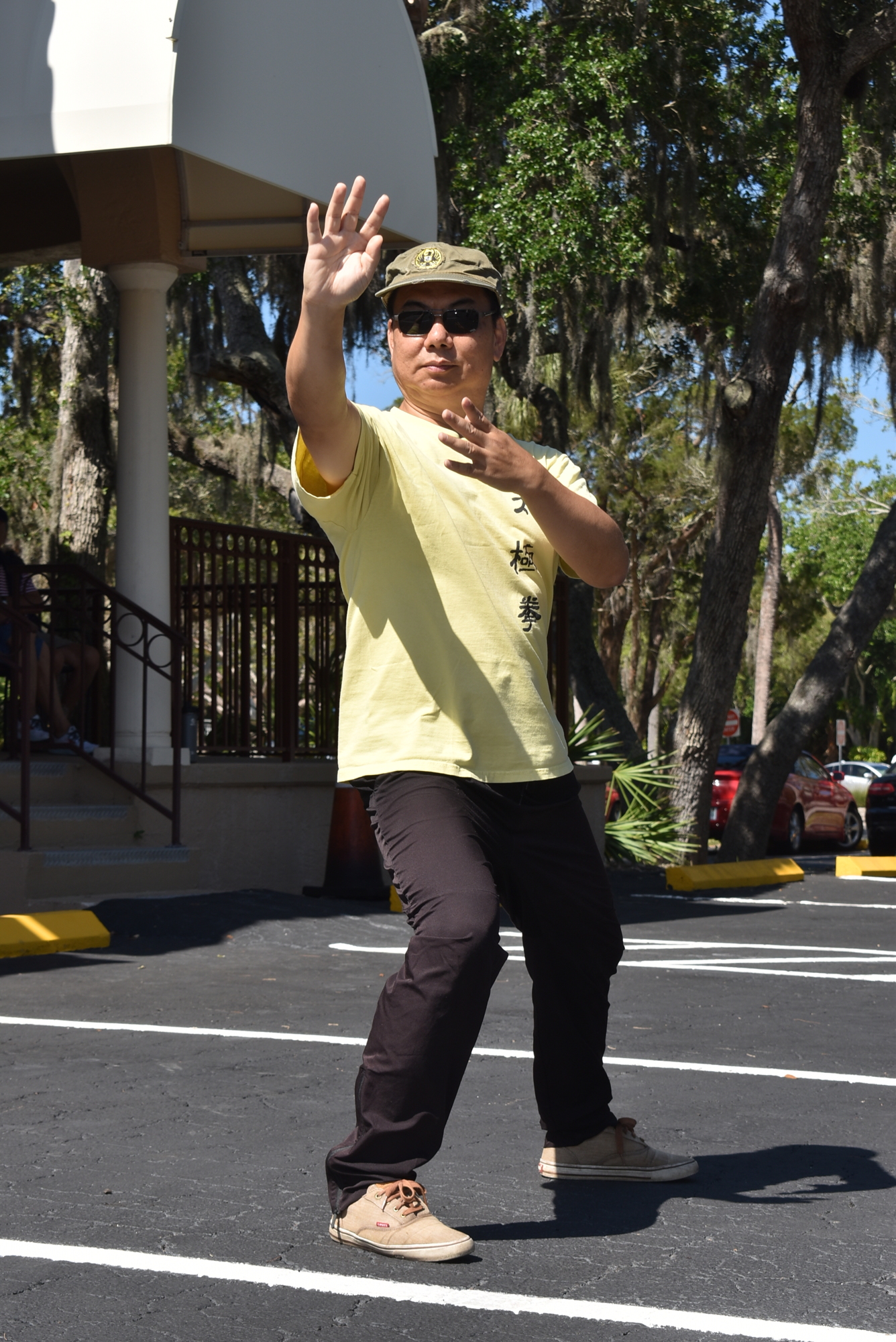 Max Yan showed students a flowing form of tai chi after class.