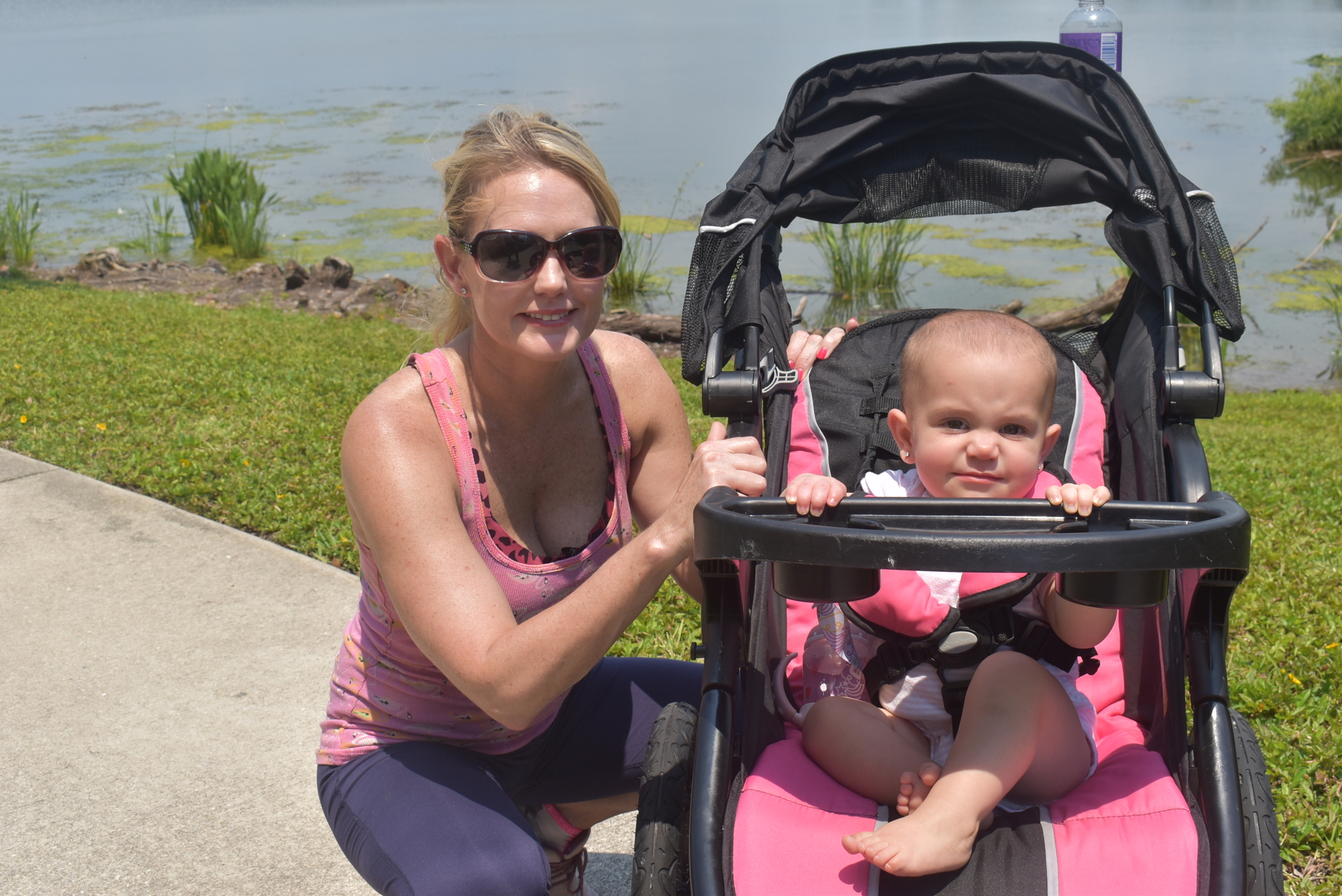 Lake Vista's Jensen Aldrich loves taking her 1-year-old daughter Shayne Aldrich for walks around Lakewood Ranch, especially when they see gallinule birds.