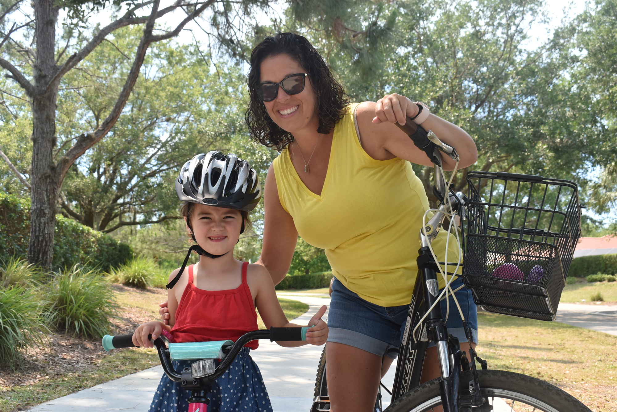 Greenbrook's Kim Pinto has prioritized providing normal and fun experiences, such as riding bikes with friends or swimming at the pool, for her 4-year-old daughter Lively Pinto.