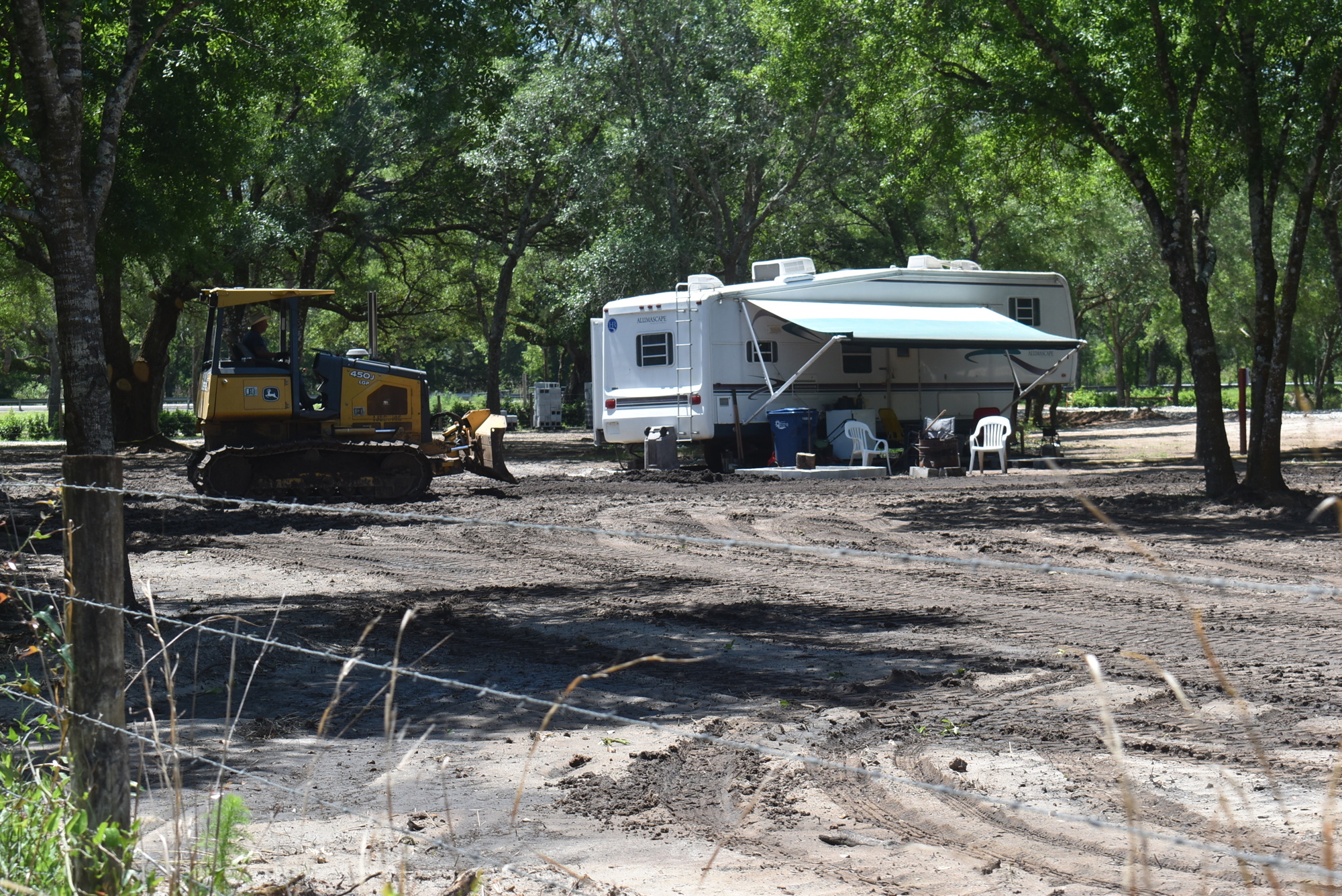An RV and a bulldozer sit on the Mallaranny property April 14. Manatee County Code Enforcement Officer Tanya Shaw said RVs are not supposed to be on the site.