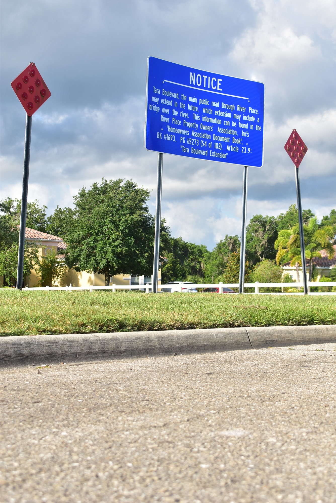 A sign stands at the southern end of Tara Boulevard, where a bridge that would've connected the road with Honore Avenue was planned for construction. The plans were scrapped by the Manatee County Commission on May 11.