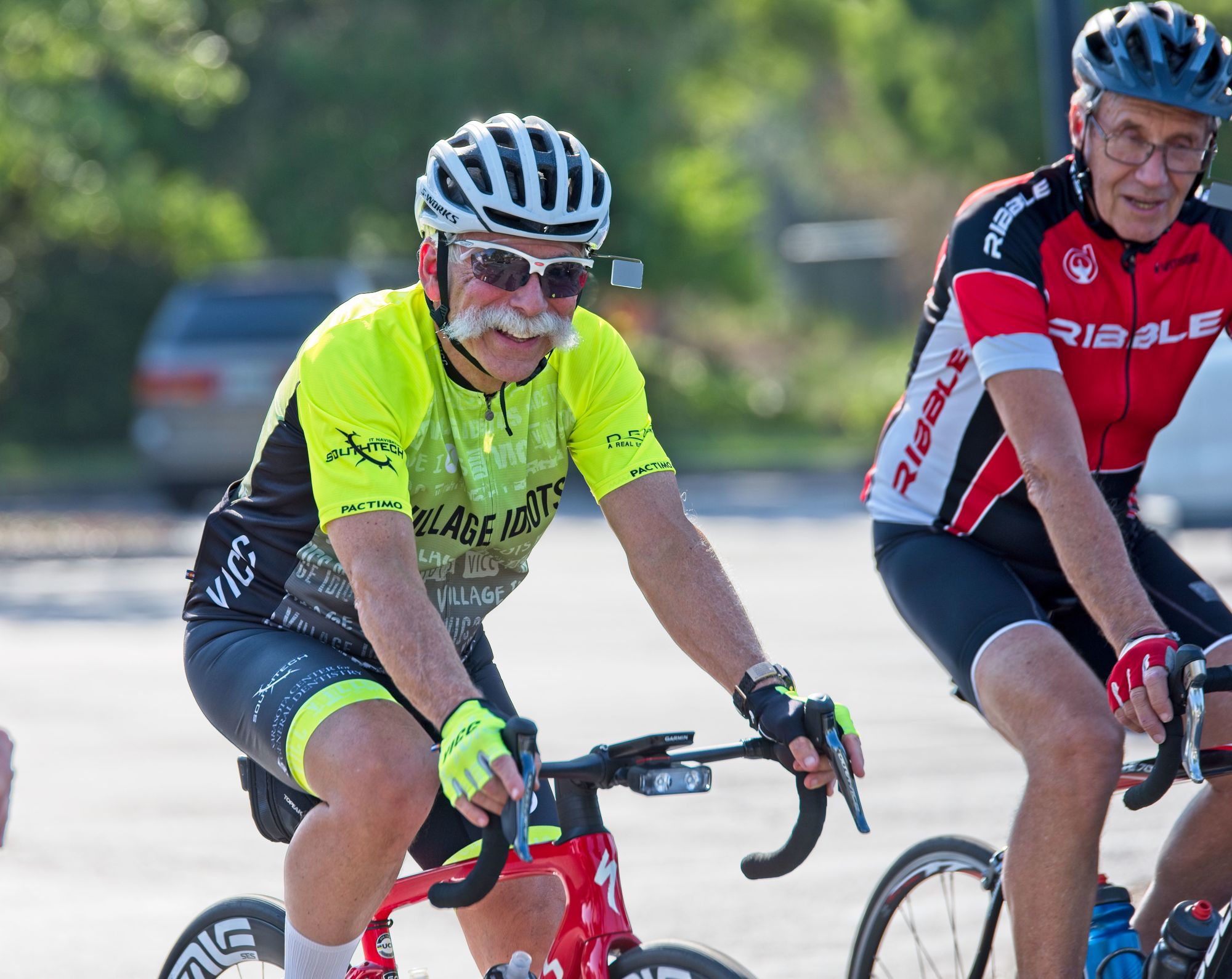 Chris Brown and Roberto Ferracini warm up before a Wednesday night ride with the Village Idiots Cycling Club, which was named the Florida Bicycle Association's Club of the Year in 2020. (Photo courtesy of OdellPhotos.com)