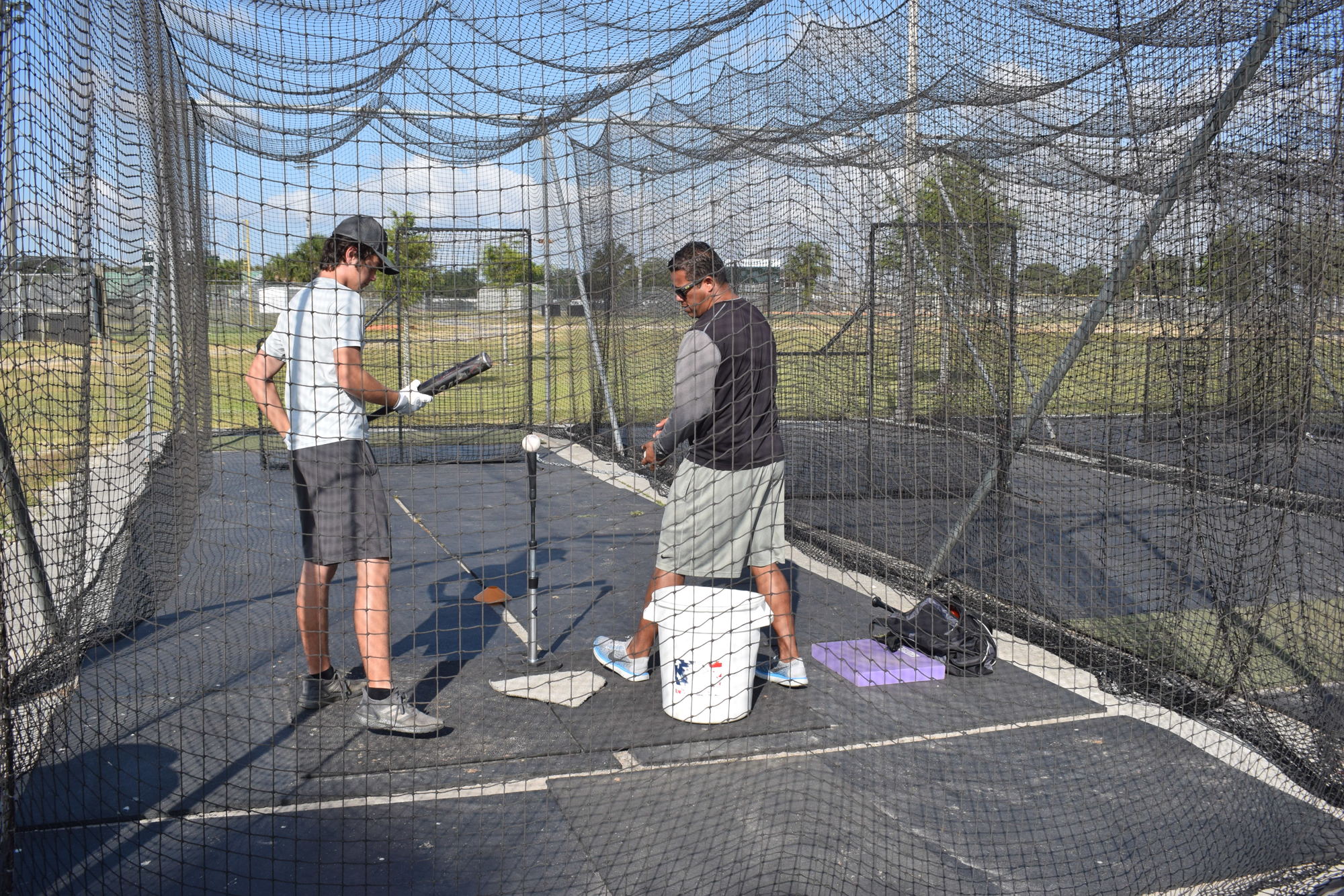 Lakewood Ranch's Brandon Cush, 15, gets lessons from Jonathan Prieto, a former Triple A player who now teaches for the Florida International Baseball Academy at Elevation Prep Academy of Sarasota.