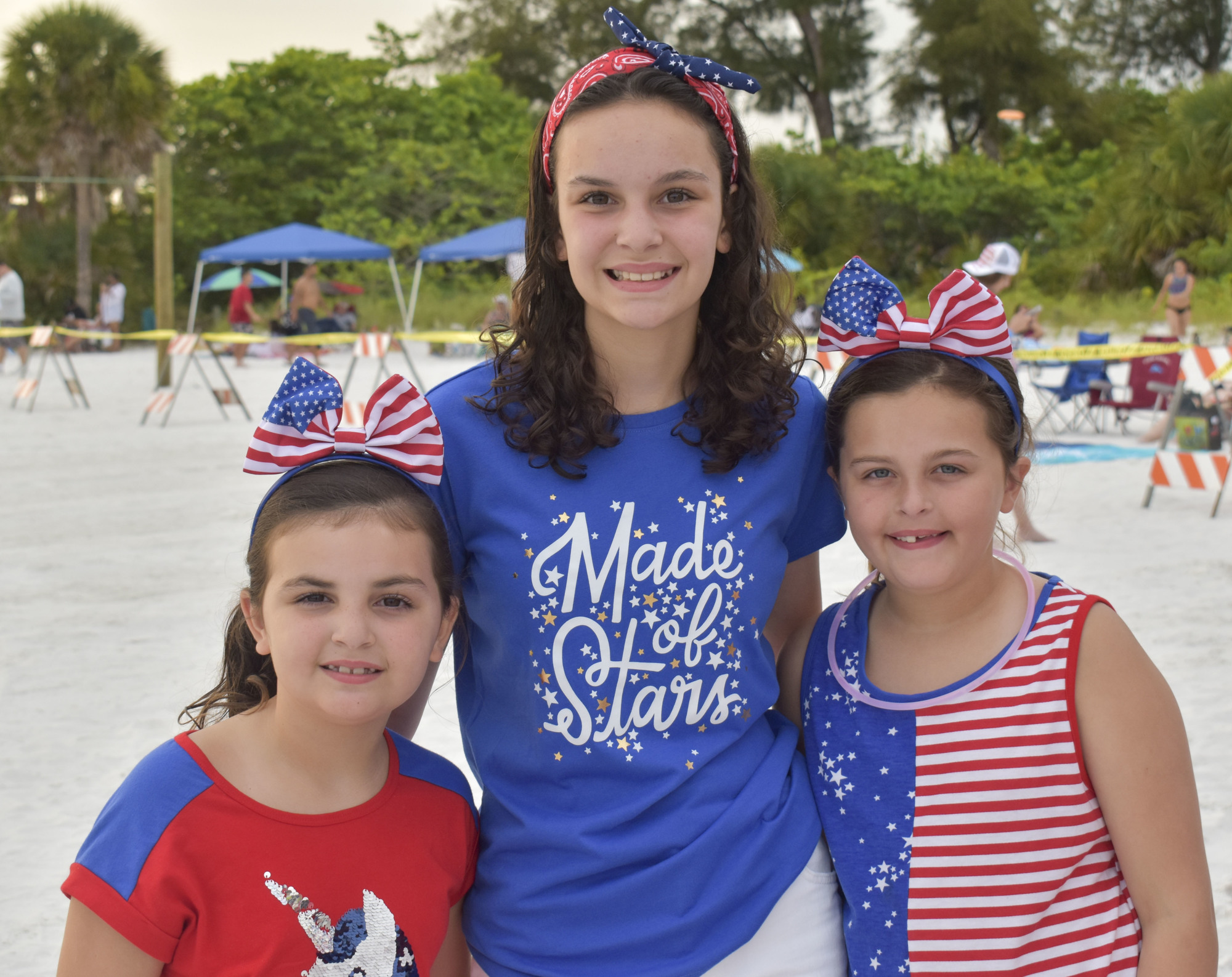 In 2019, Ashlyn, Genevieve and Madeline Pidra enoyed the Siesta Key beach while waiting for the fireworks show to begin.