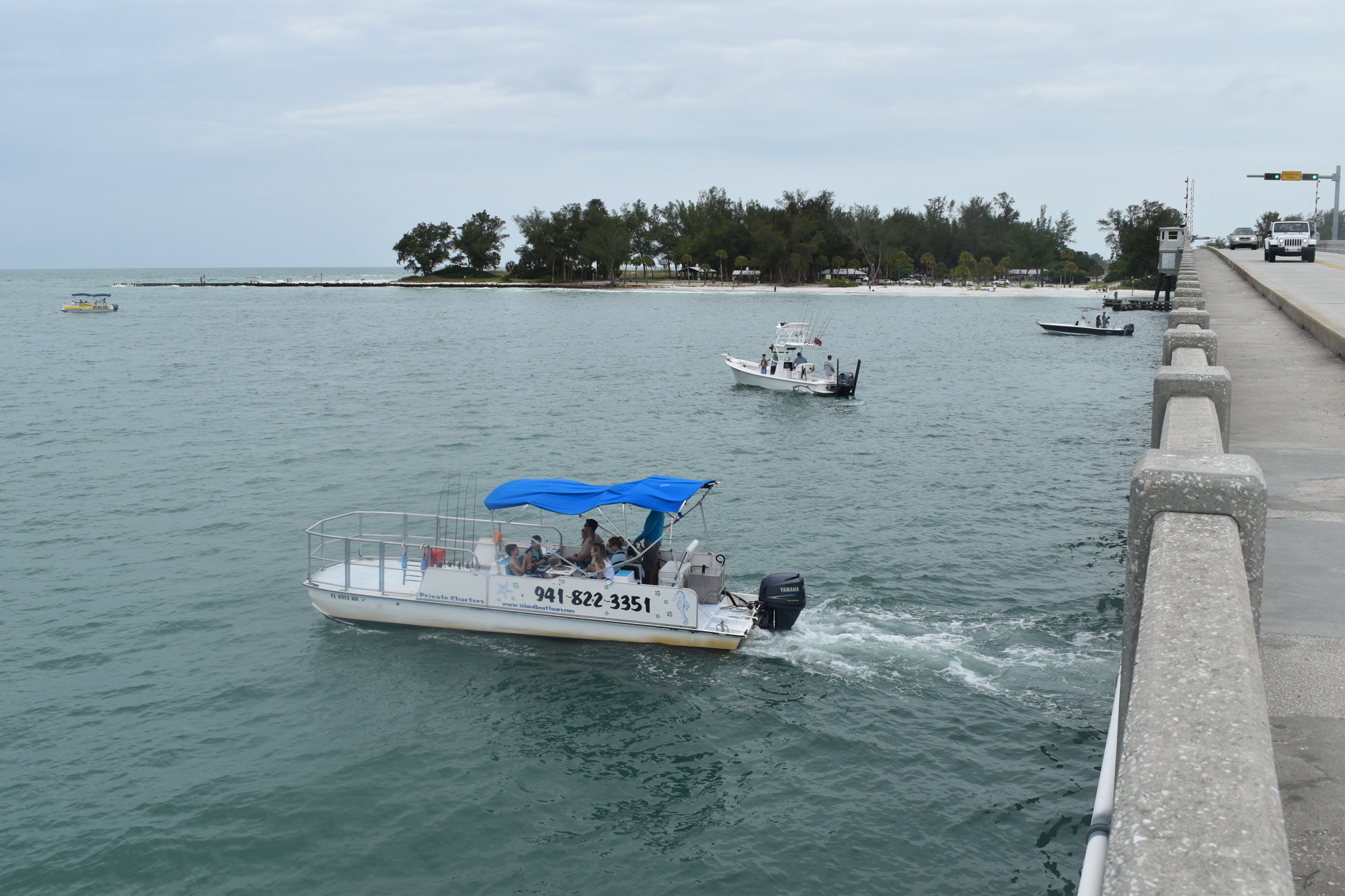 Boats navigated the water on June 16 near the Longboat Pass Bridge.