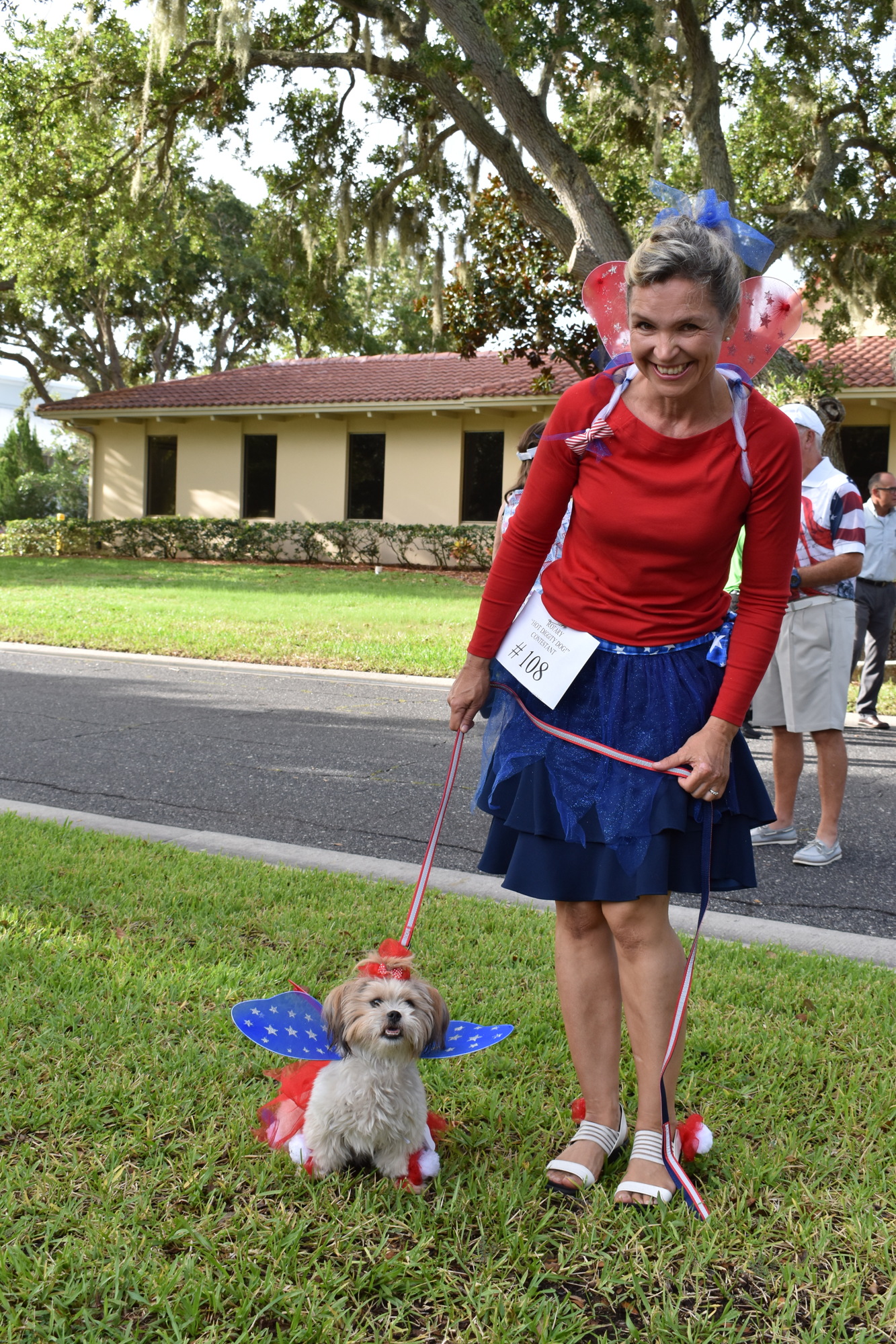 Martina Kinslow poses for a picture with her dog Tinker Bell.