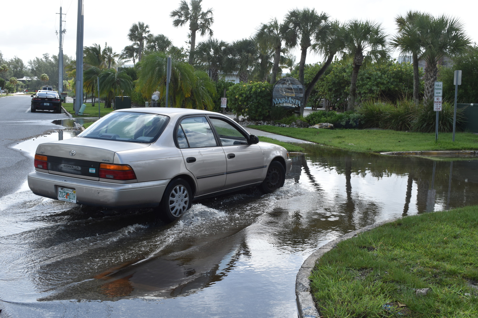 Water had accumulated on Wednesday morning at the intersection of Lois Avenue and Broadway in the Longbeach Village neighborhood near Mar Vista Dockside Restaurant .