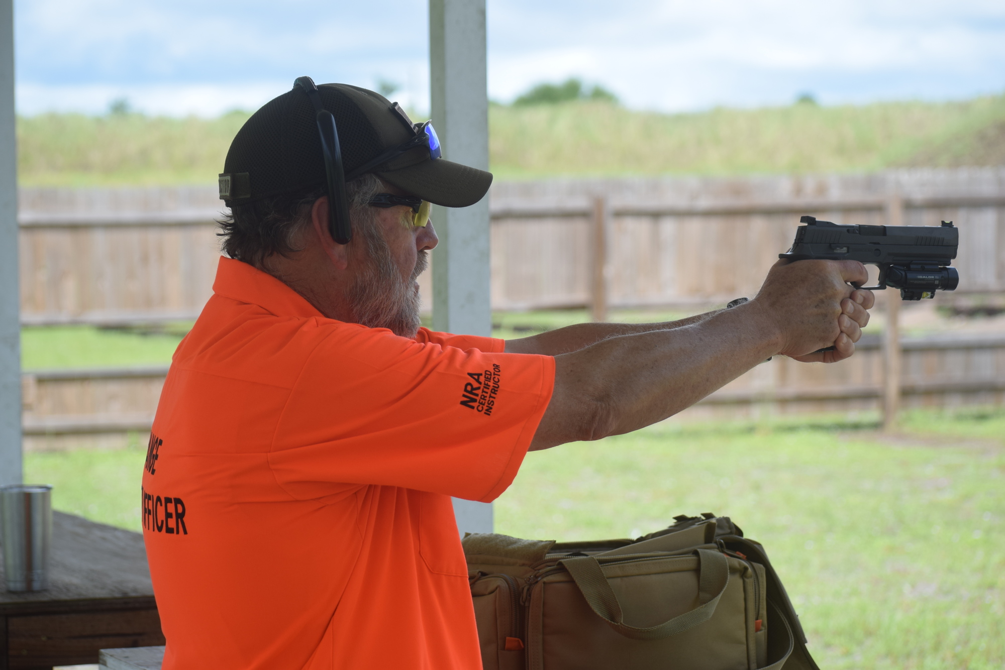 Larry Johnson enjoys giving safety tips to those who visit the Manatee Gun and Archery Club in Myakka City.