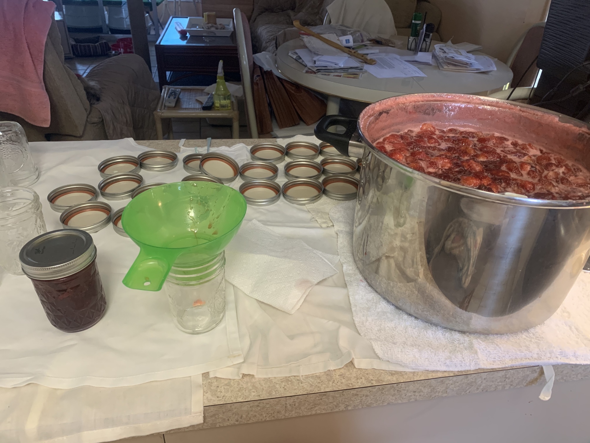 Joe Bertucci makes jars of strawberry jam in his kitchen. Courtesy photo.