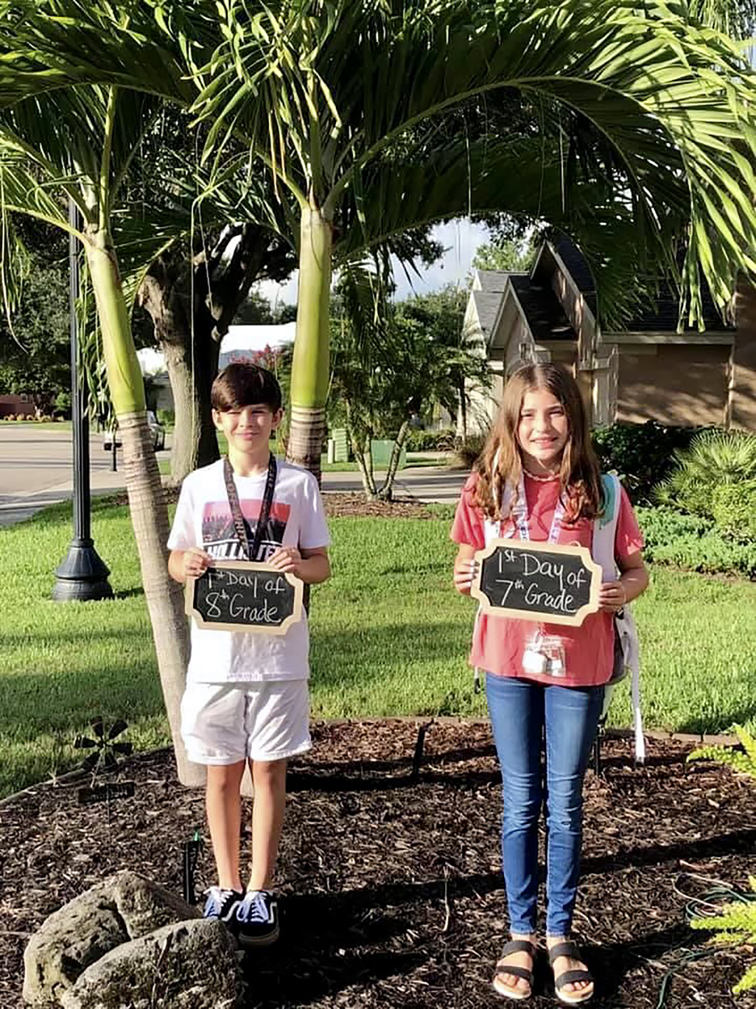 Nicolas Juliano and his sister, Isabella Juliano, know it's time to take photos on the first day of school when the chalkboards come out. Courtesy photo.