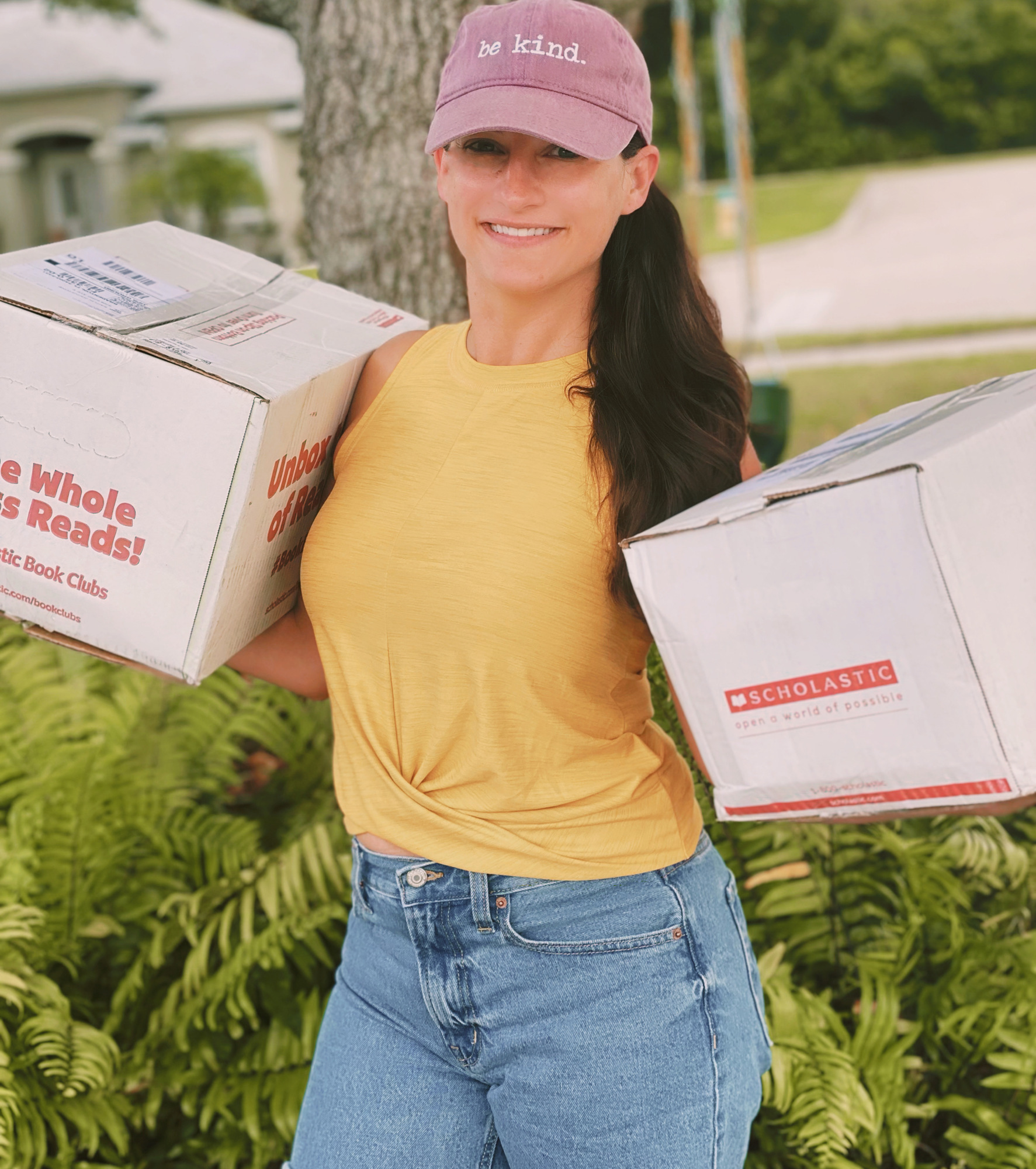 Kaitlin Johnstone delivers books on behalf of Kind Cotton. Courtesy photo