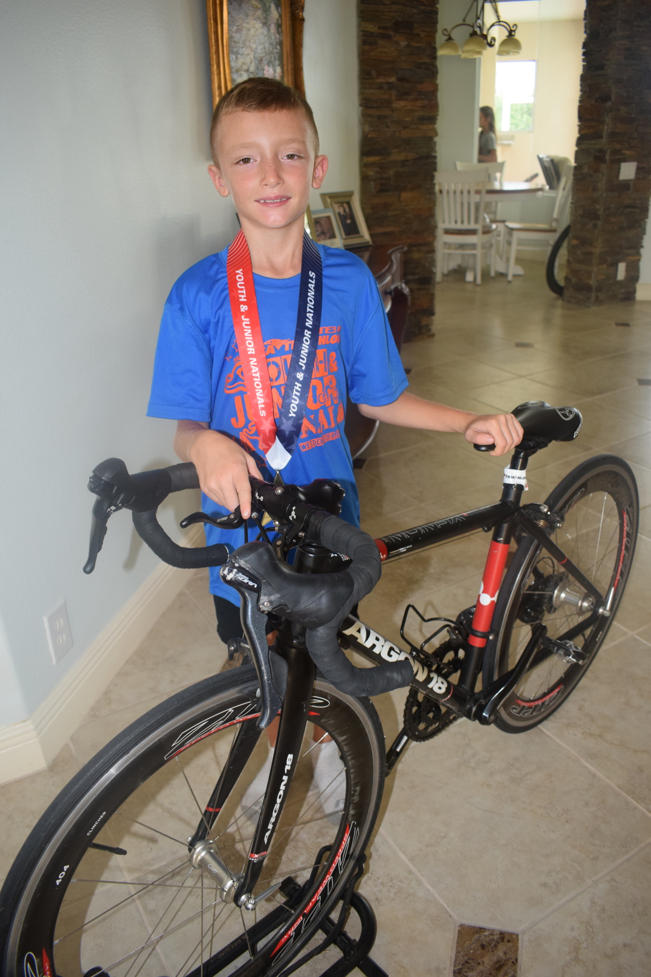 Aaron Westrip is dominating in the cycling portion of the triathlon even though he once struggled to learn to ride a bike.