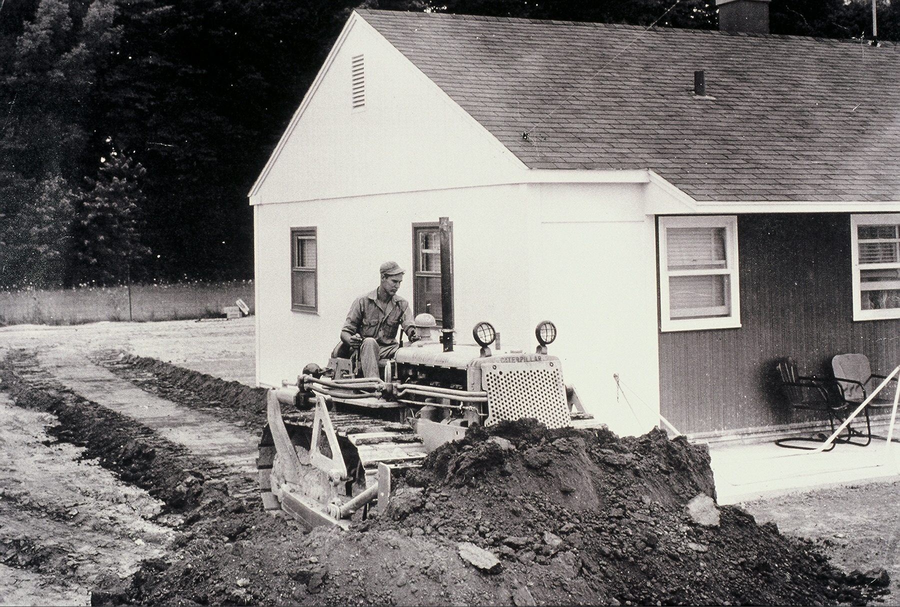 Roy Woodruff runs a bulldozer back in the early days of Woodruff & Sons.