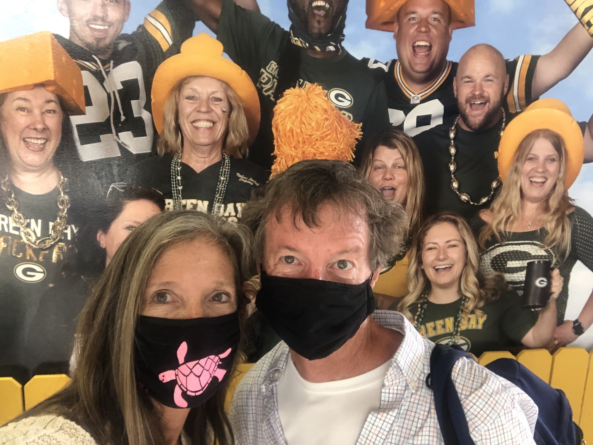 Cyndi and Mike Seamon snap a photo with some cheeseheads on the way to family vacation in Wisconsin. courtesy photo.