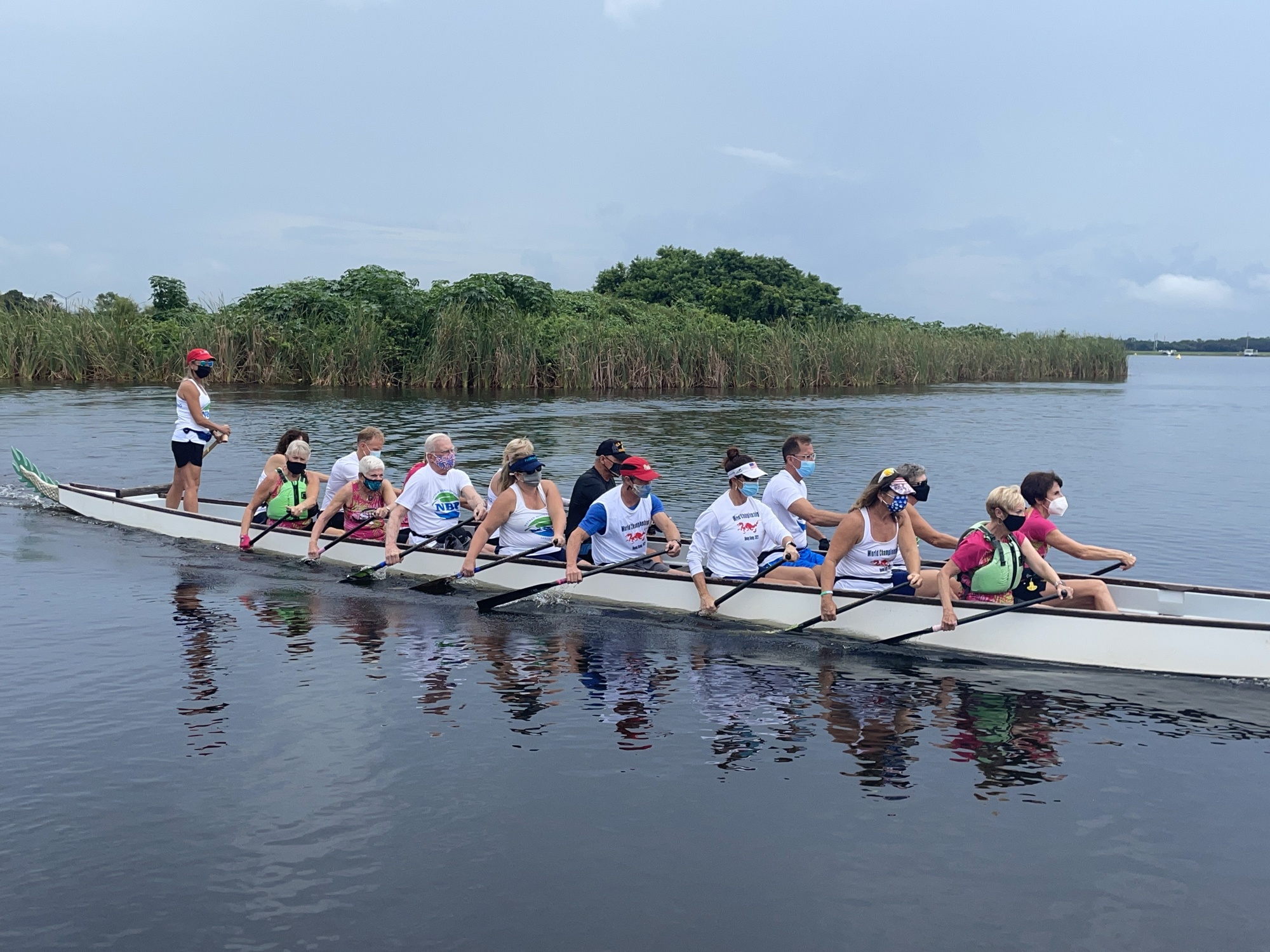 Paddlers from the NBP Dragons and Survivors in Sync get in some practice before the Club Crew Championships, to be held Oct. 1-3 at Nathan Benderson Park.