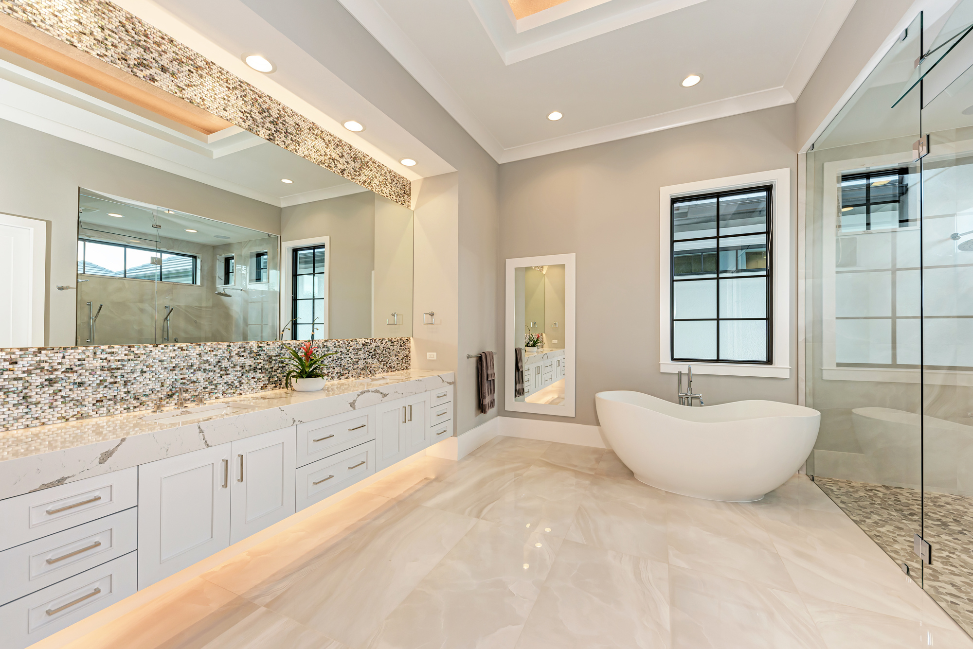 The spacious master bath features a modernistic soaking tub.