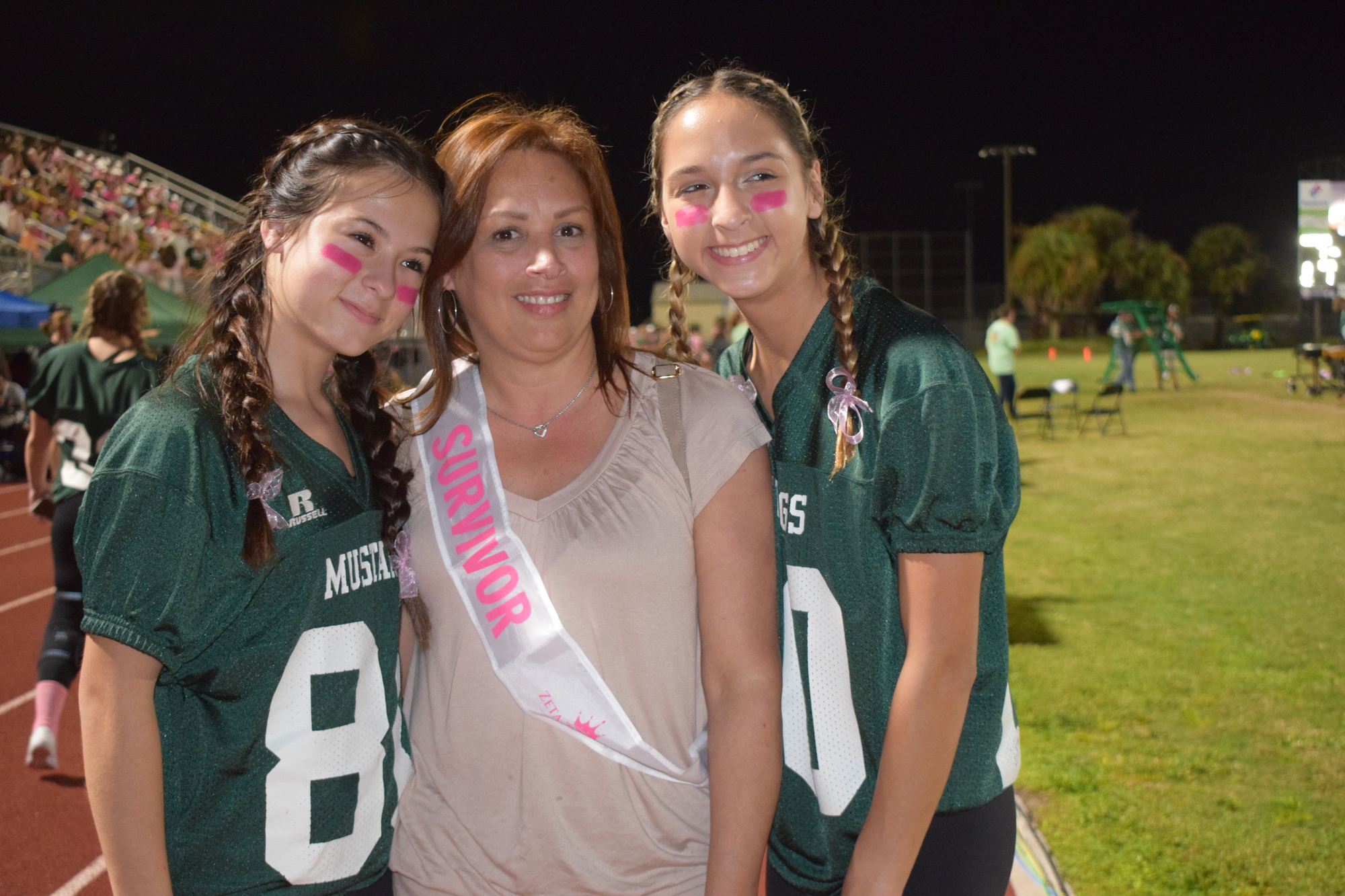 Lakewood Ranch High School seniors Alyssa and Charlize Ucciferri support their mother, Giselle Ucciferri, as she celebrates 20 years in remission. Ucciferri was diagnosed with breast cancer and uterine cancer.