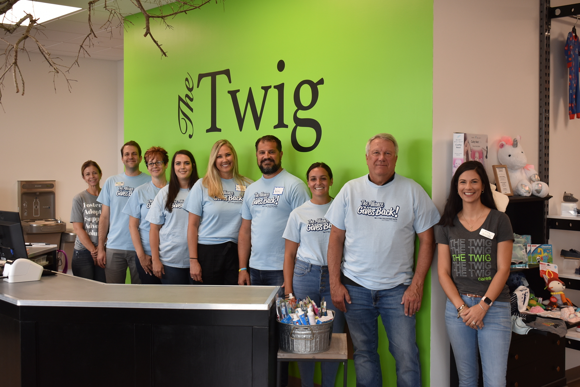 A group of seven volunteers from the Lakewood Ranch Business Alliance helped sort donations and restock racks at The Twig on Thursday. The Twig allows foster children to shop for clothes free of charge. Photo by Scott Lockwood.