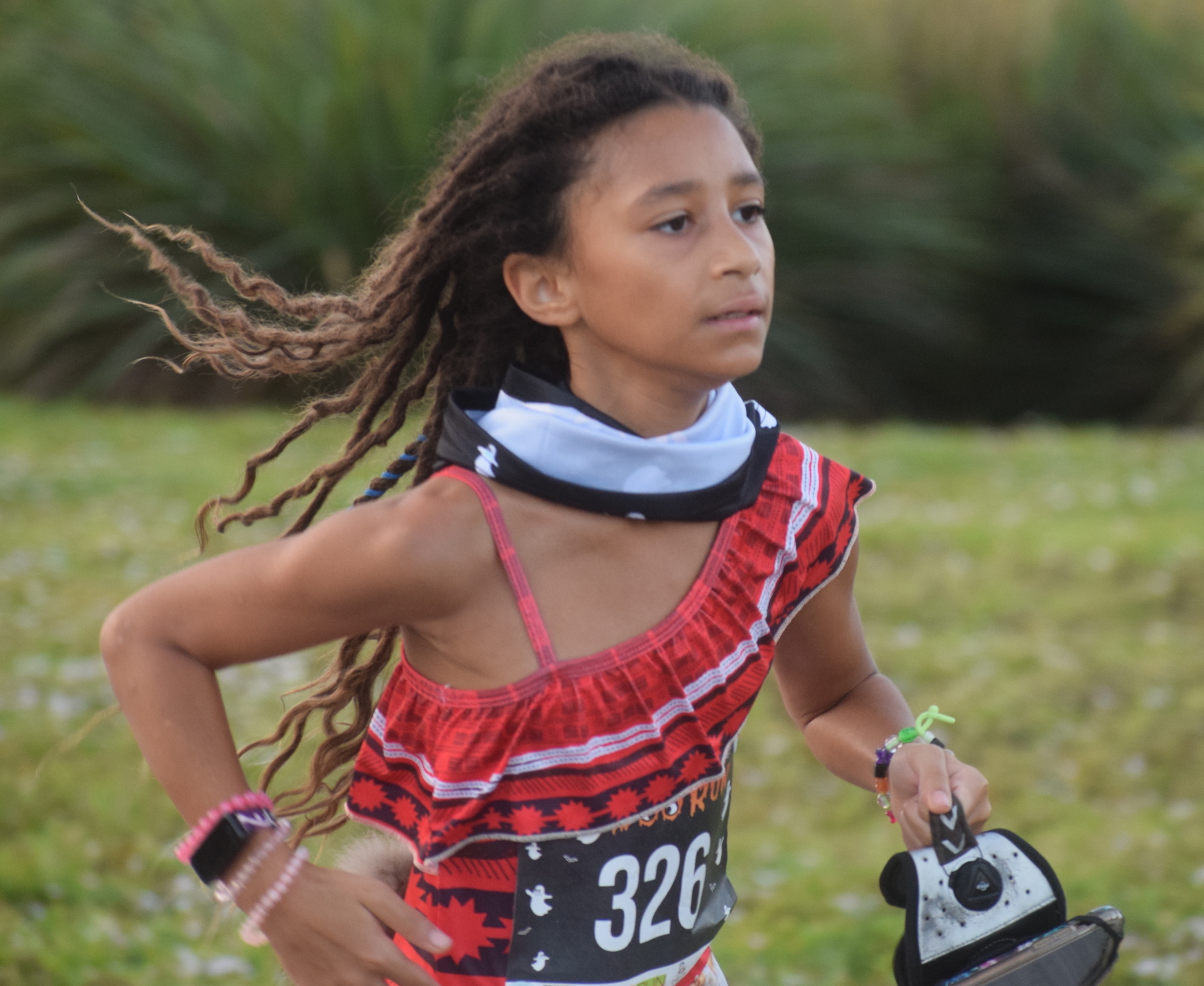 Lakewood Ranch 10-year-old Shadai Magra was the first youth runner to finish the Boo Run. File photo.