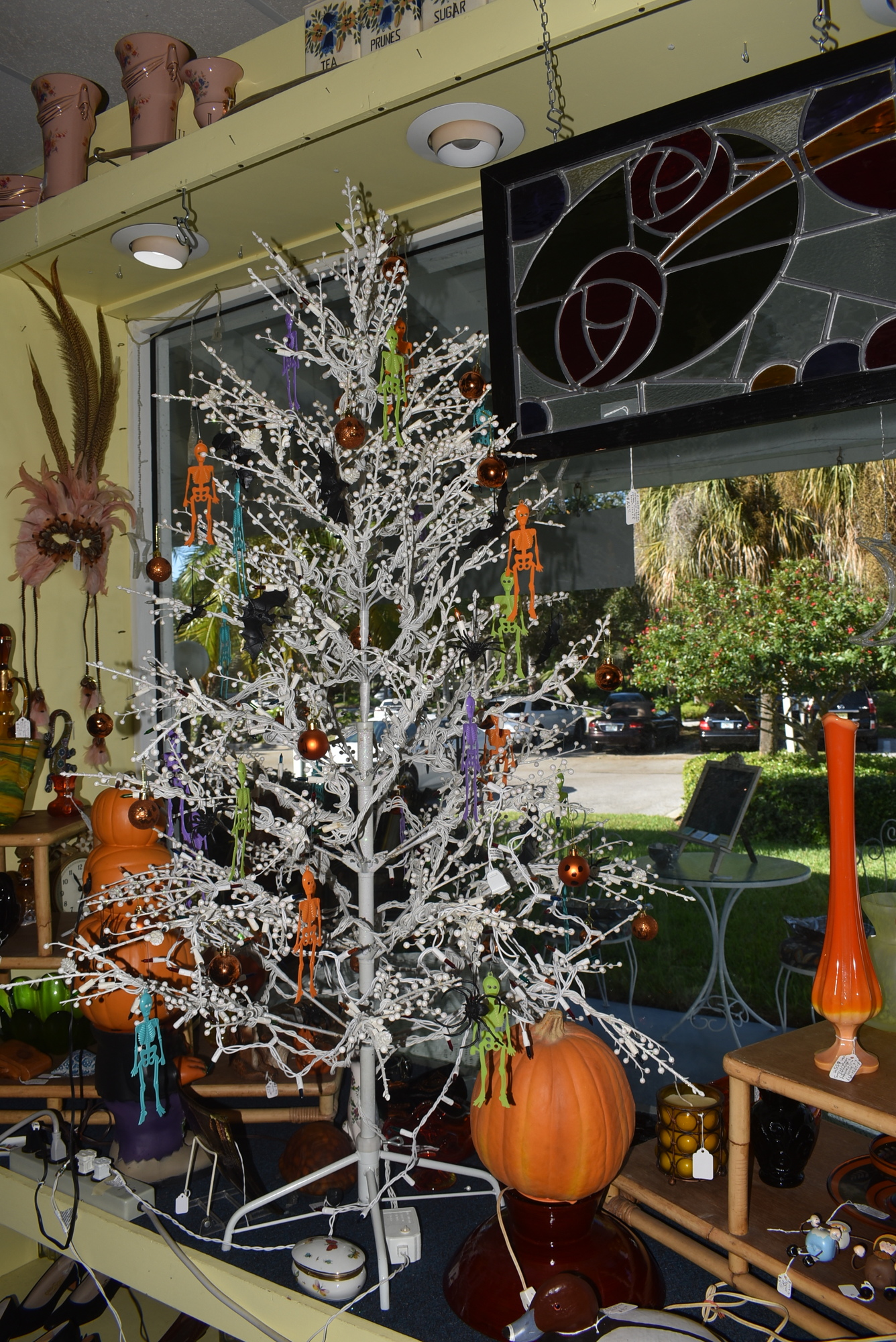 At Steff's Stuff, the front window sparkles with a Halloween tree.