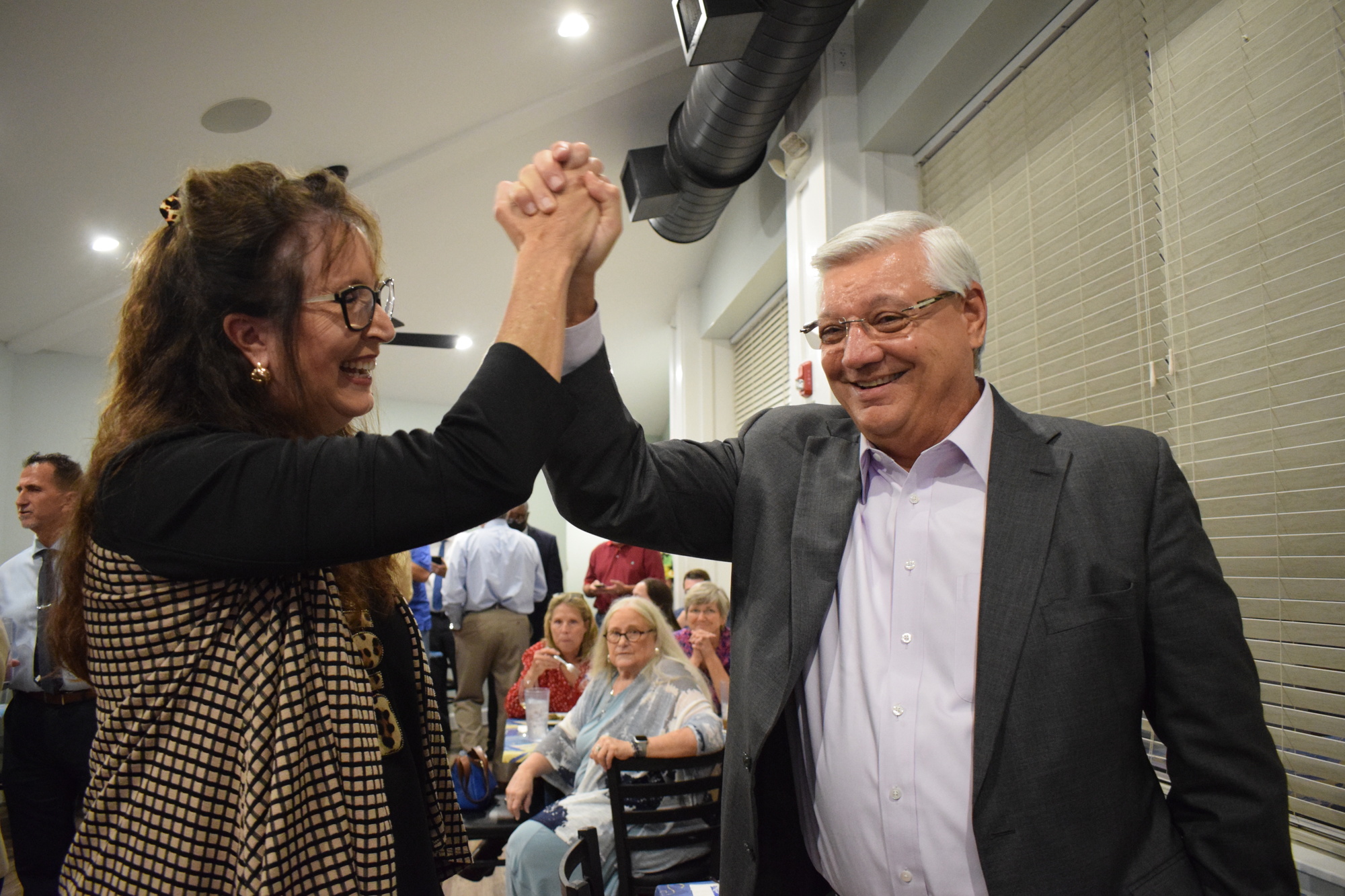 Cynthia Saunders, the superintendent of the School District of Manatee County, celebrates the renewal of the district's 1-mill property tax referendum with Ernie Withers, a co-chair of Forward Manatee.