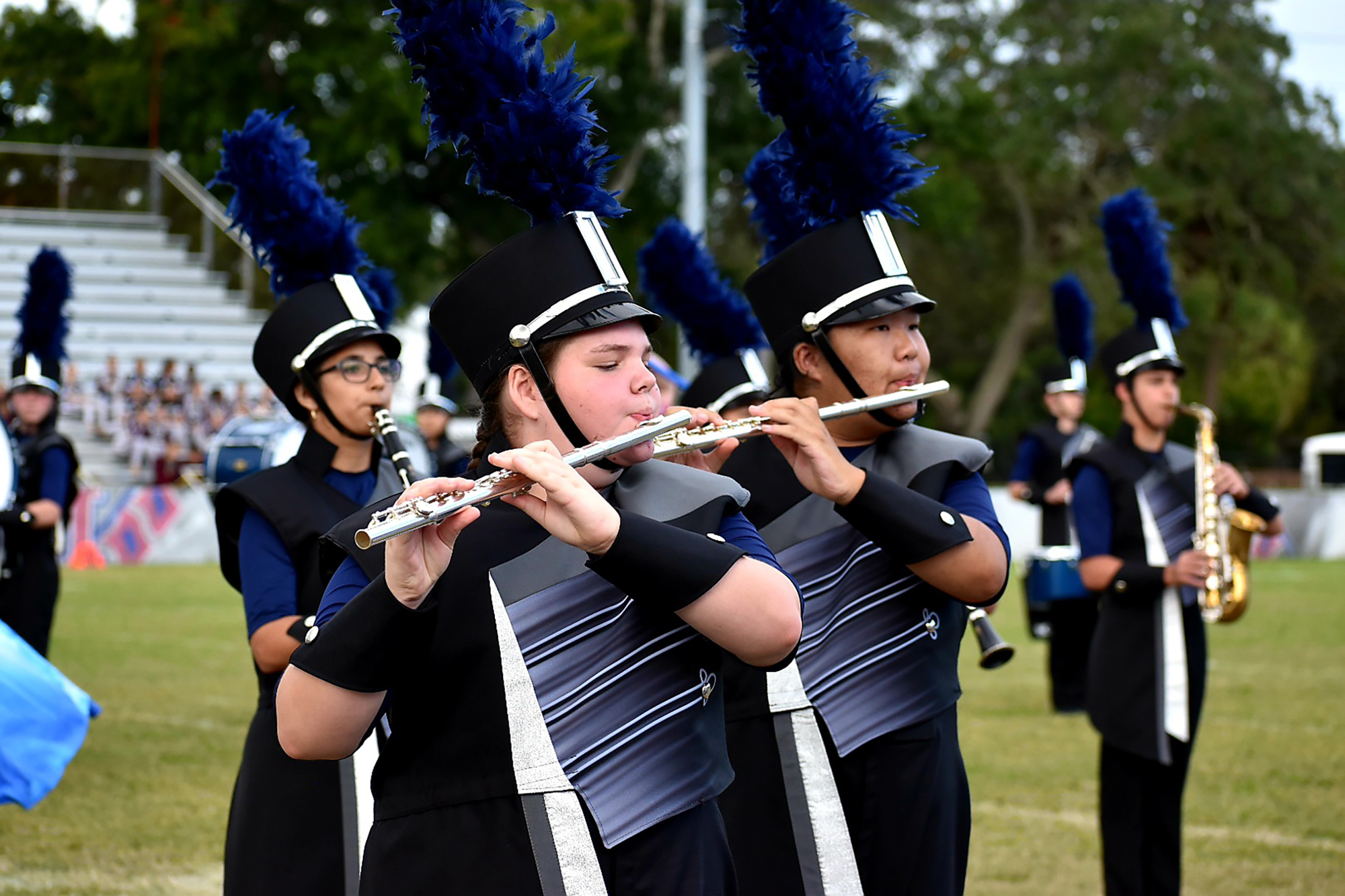 Andrea Azuero, Cadence Morie and Jamal Pham march with the Pride of Parrish Marching Band. Courtesy photo.