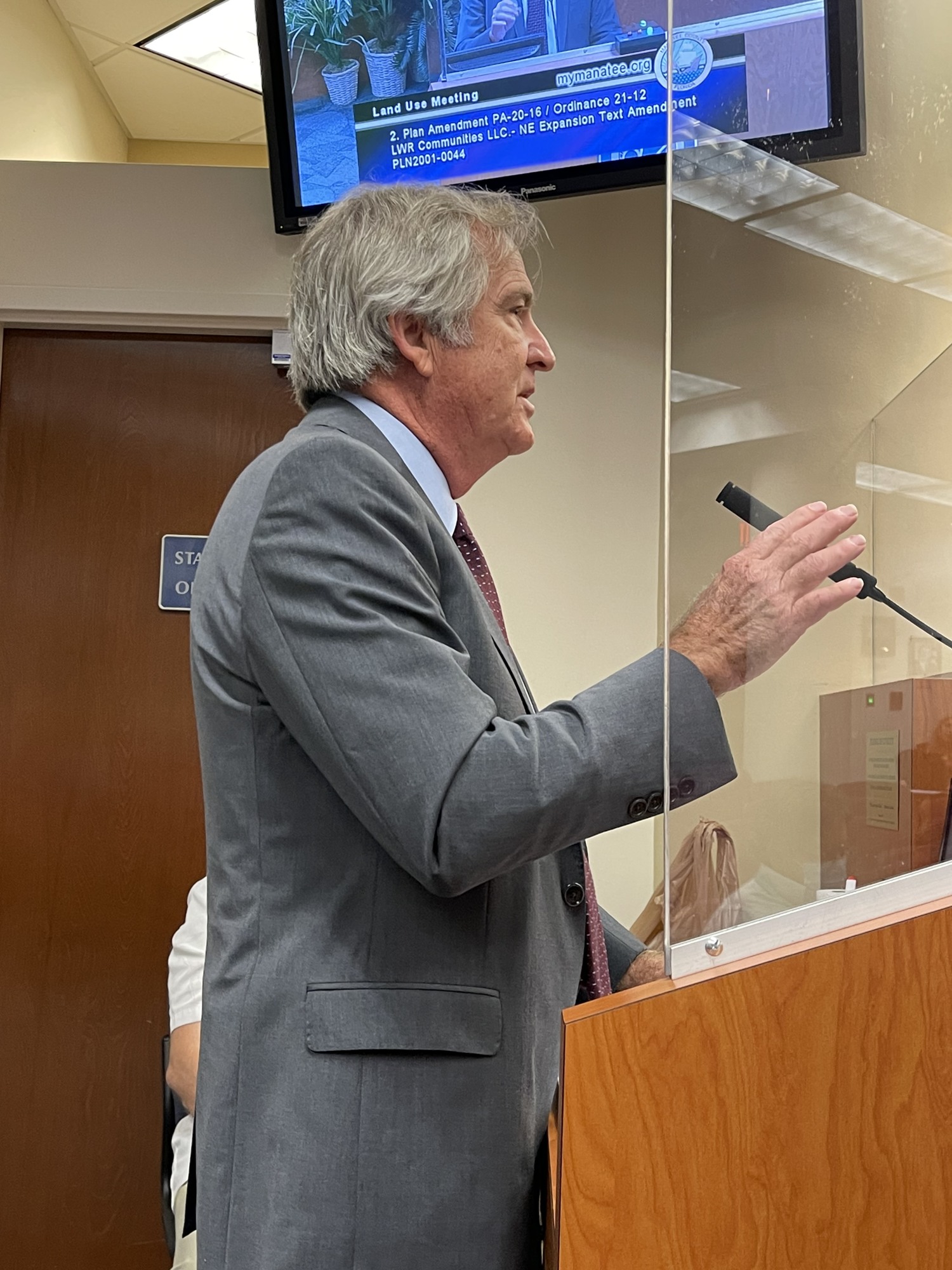 Caleb Grimes, an attorney representing LWR Communities, outlines changes to an amendment that will allow for an expansion in the northeast corner of Lakewood Ranch.