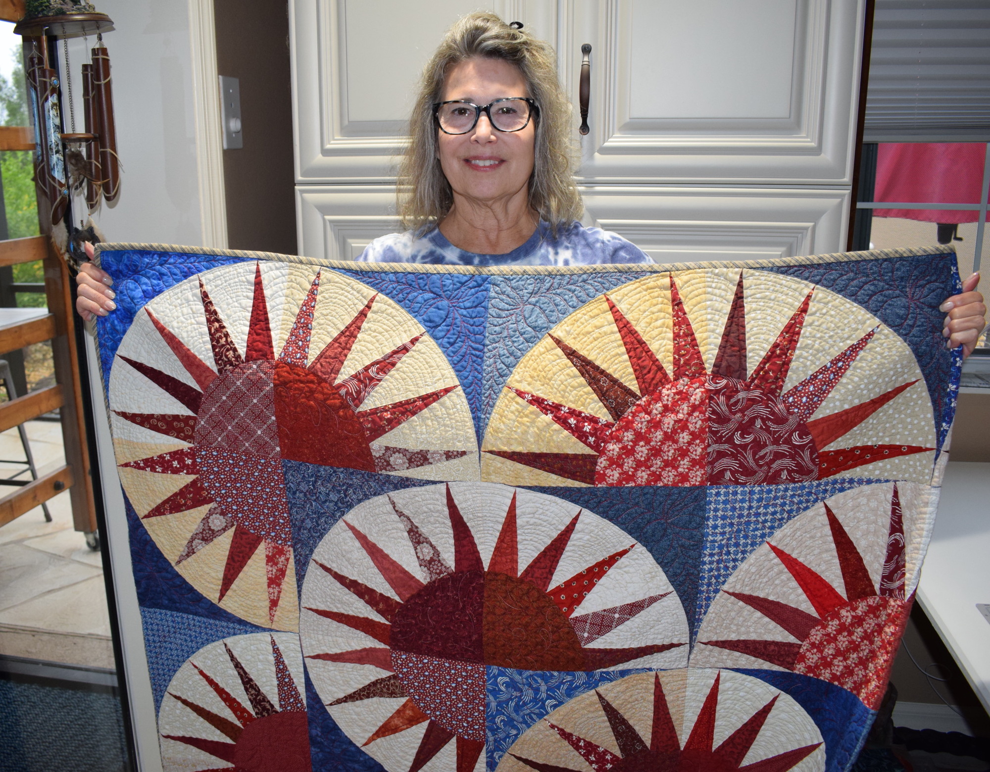 Panther Ridge's Ann Schuknecht became a quilter because she loves the warm feel of fabric.
