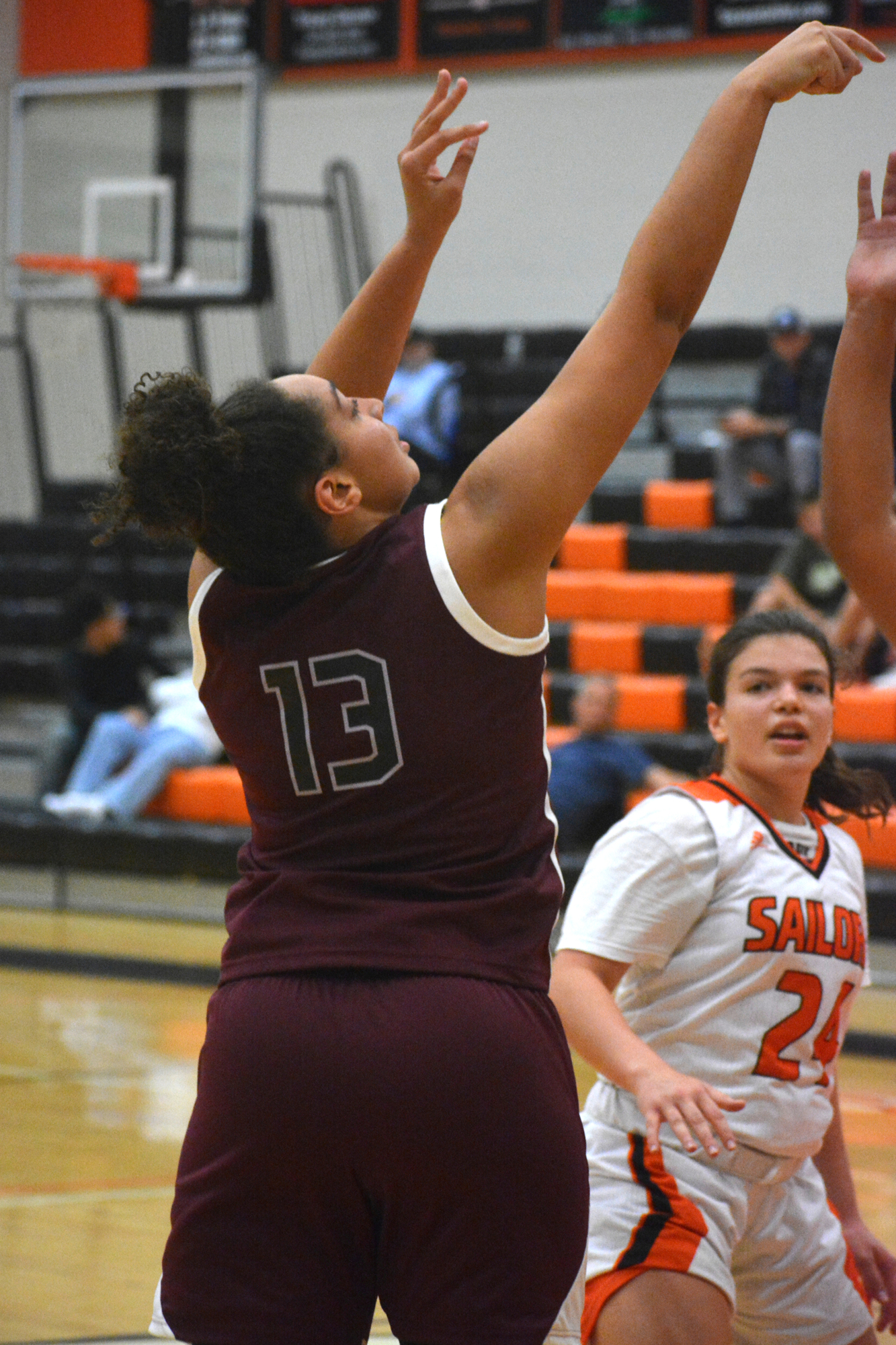 Senior forward Bella Patterson hits a jump shot against Sarasota High. Patterson is one of the team's go-to offensive players in 2021. She scored 20 points against the Sailors.