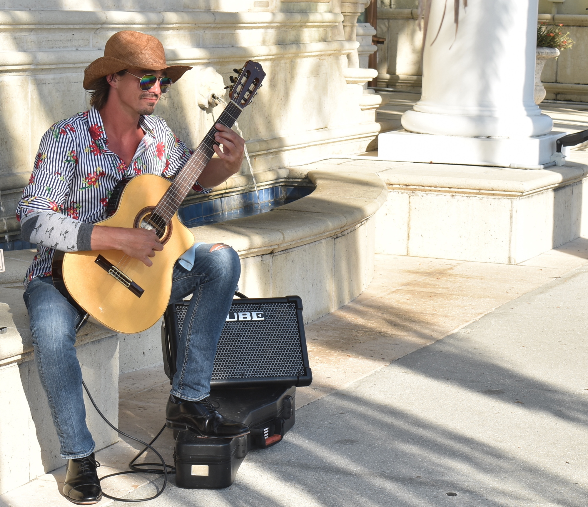 JUNE: Jesse Lippert plays guitar in St. Armands Circle.