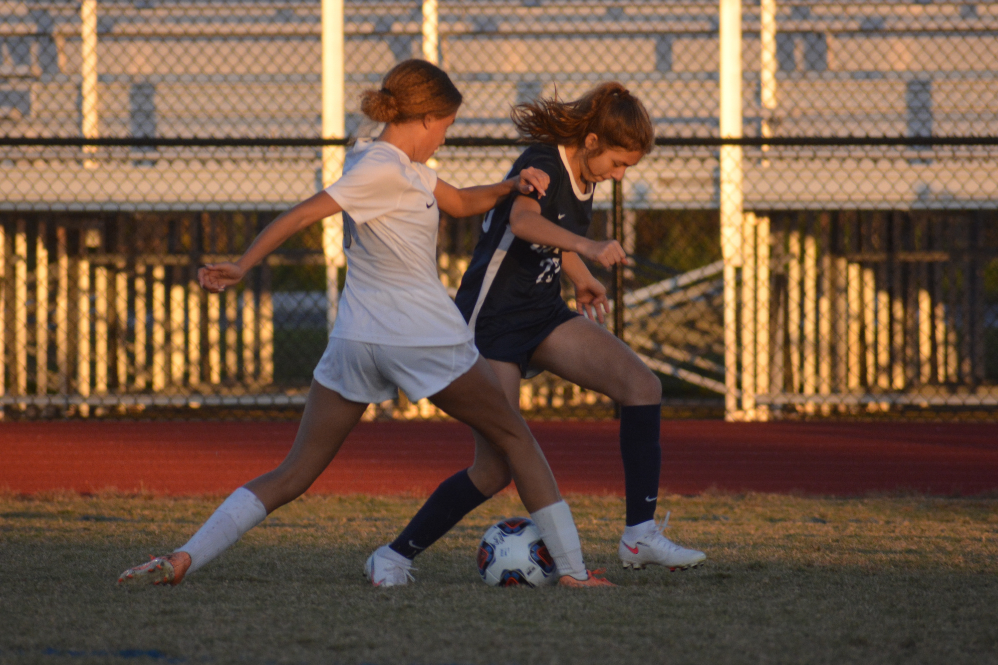 Parrish Community sophomore Natalie Greenhaw, here beating a Braden River defender down the field, is one of the Lakewood Ranch-area players contributing to the Bulls in 2021.