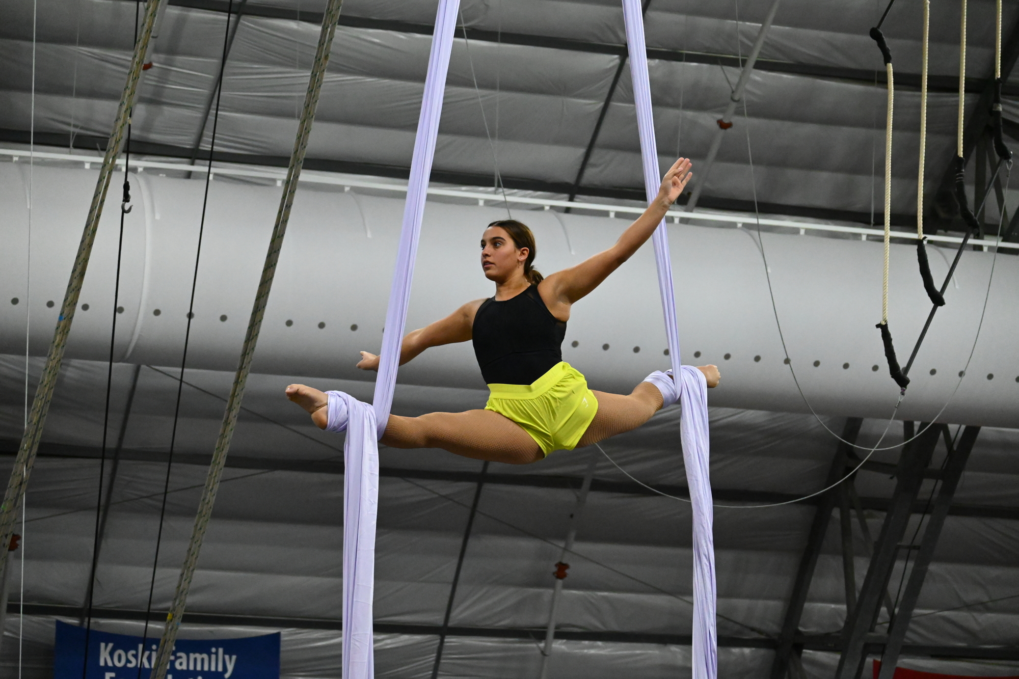 Emma Clarke, a junior at Sarasota High School, soars high on the silks. (Photo: Spencer Fordin)