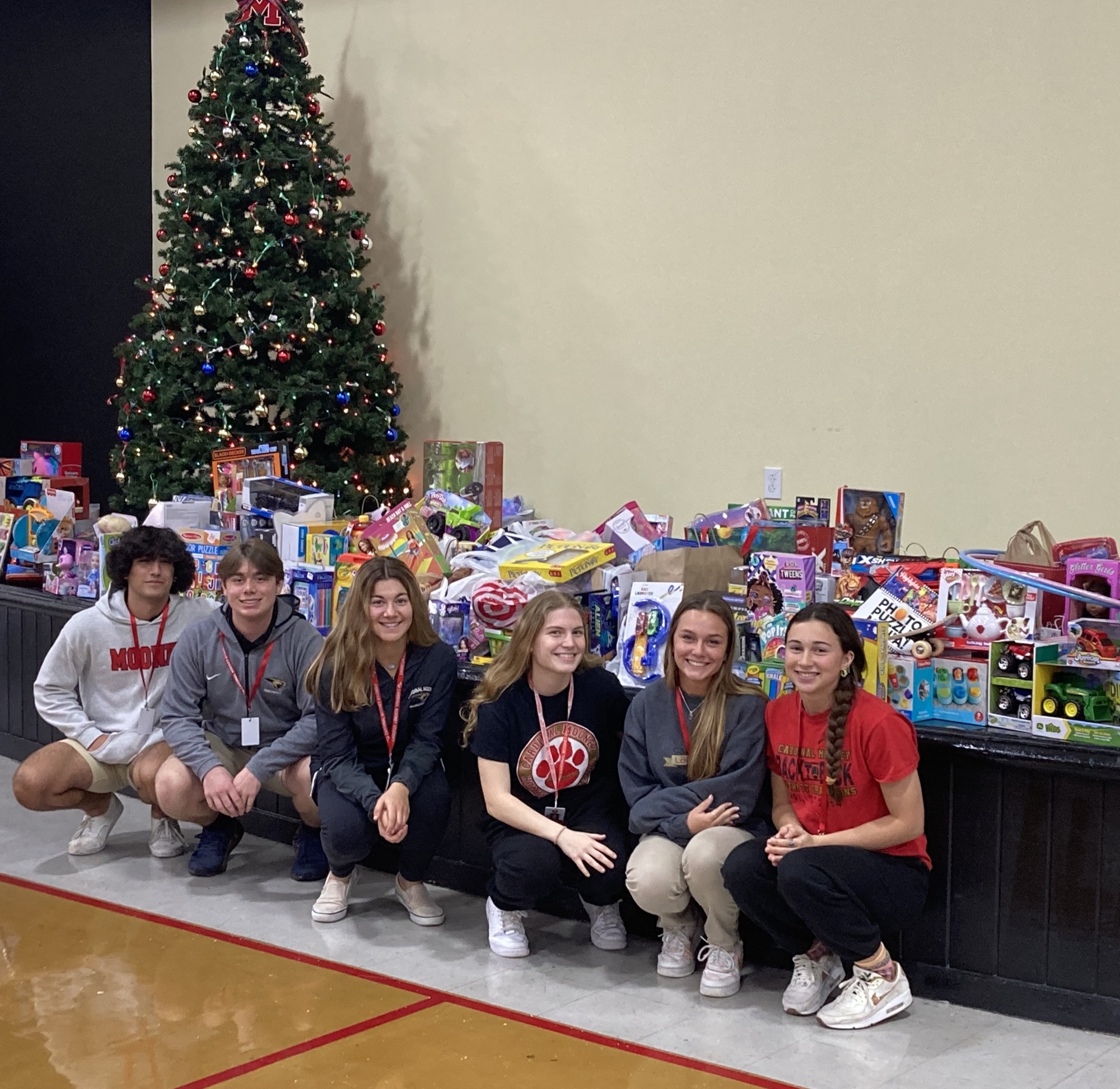 Cardinal Mooney students helped members of the Sarasota County Sheriff's Office load up donated gifts.