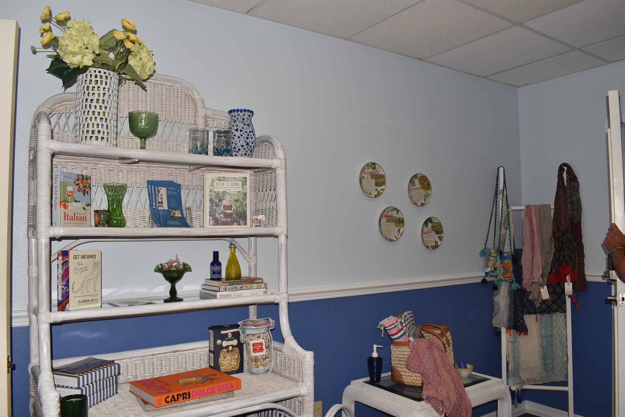 The space is decked out in calming blue and white with pops of yellow.