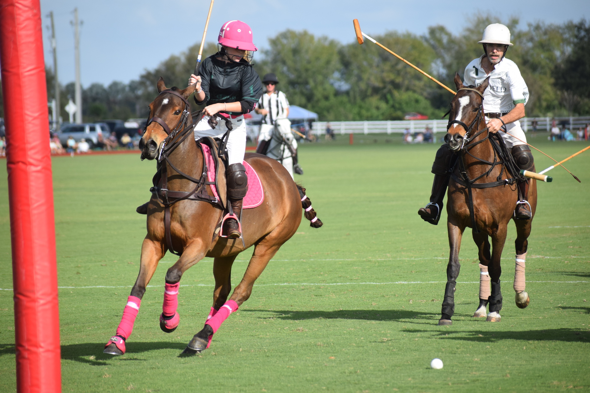 Hanna Hornung of Organic Matters/North South Wealth Management, races to the ball against Barefield's Jason Cashin.