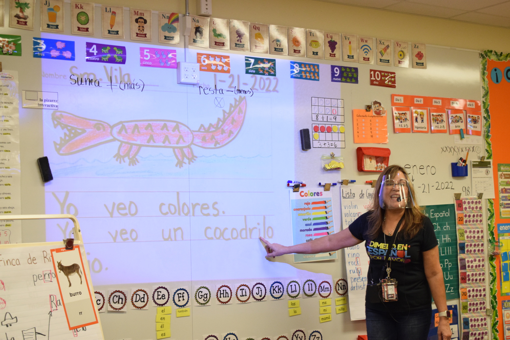 Frances Vila, a kindergarten teacher, has her students repeat each word she says in Spanish after she pronounces it for them. Vila is the Spanish teacher for the dual-language program.