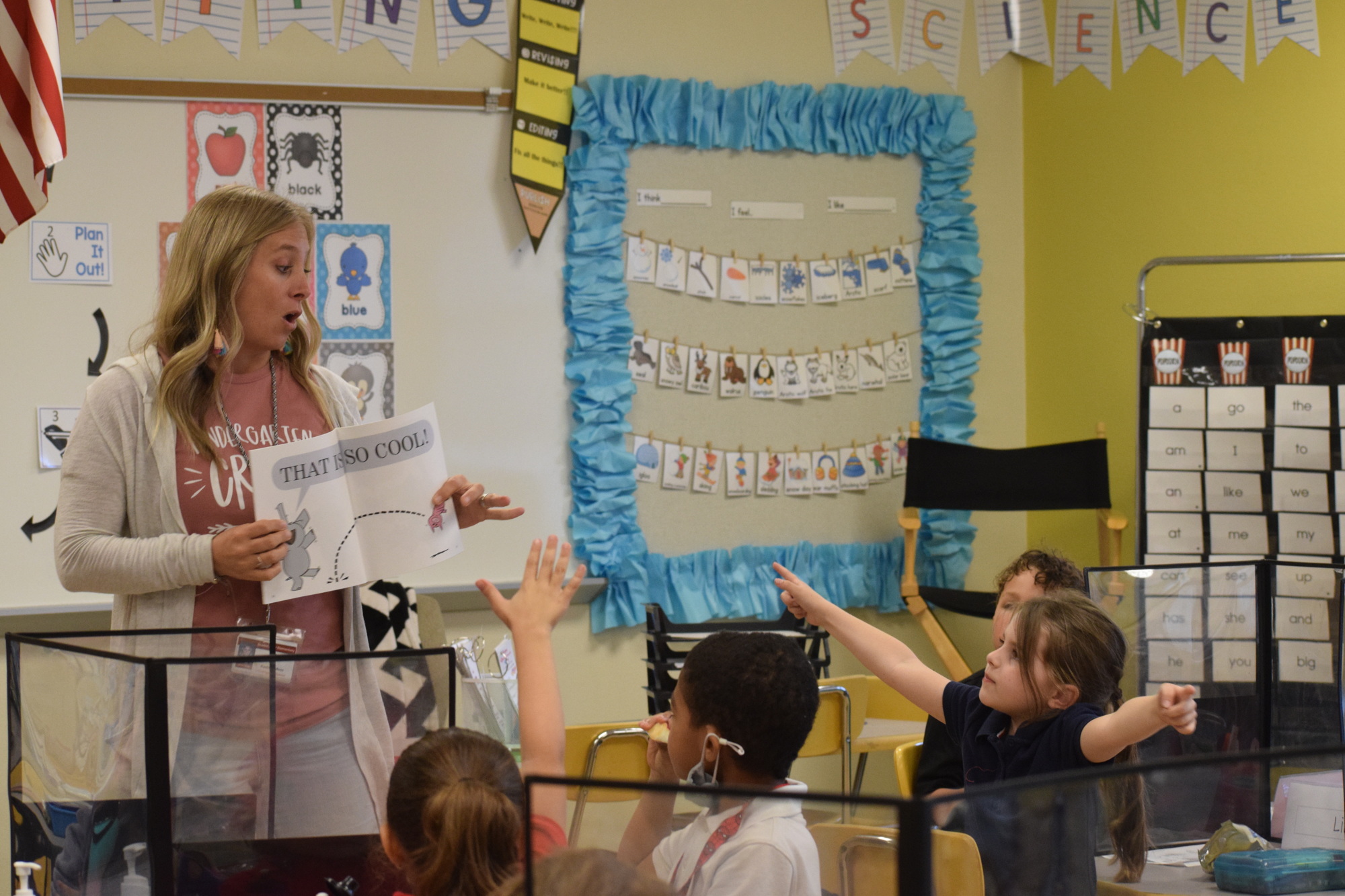 Kaehla Eidson, a kindergarten teacher, reads a book in English to her students. Eidson teaches the English portion of the dual-language program.