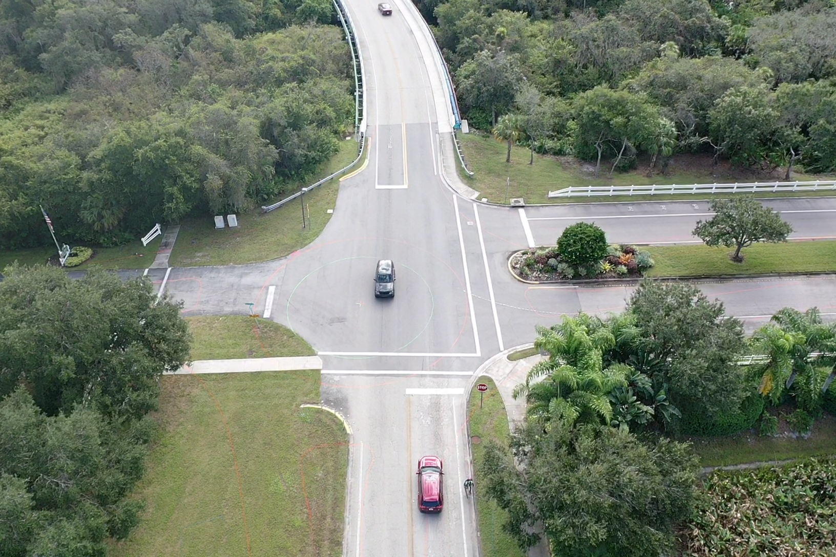 The median to the right on Old Farm Road will lose the tree and all the flowers when a roundabout is constructed. (Photo courtesy of Manatee County)