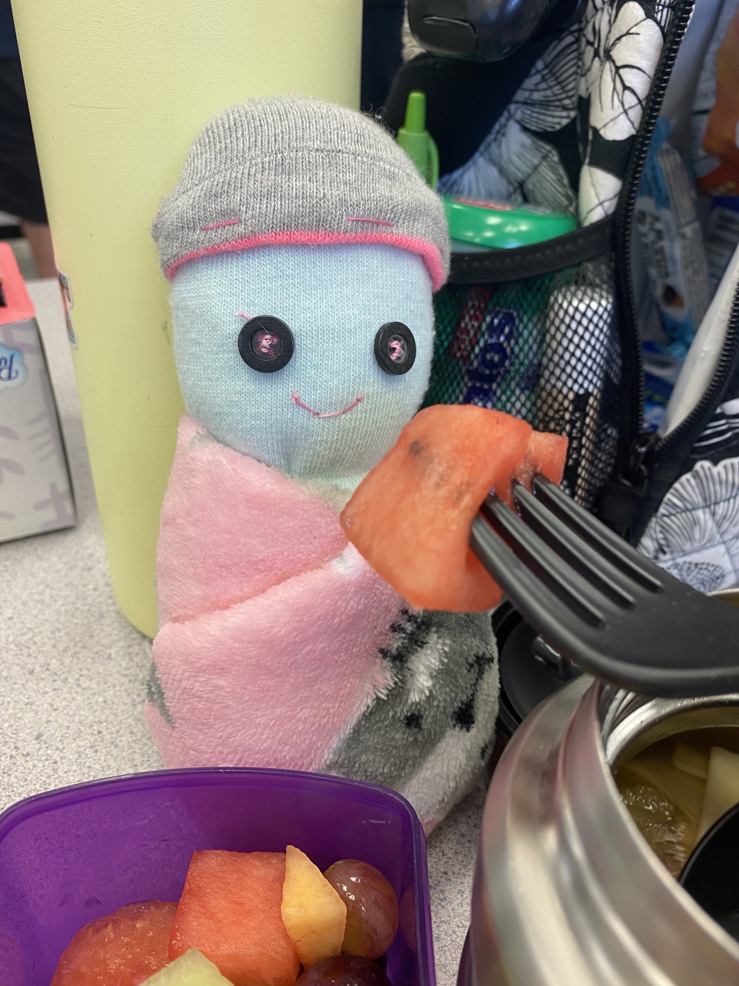 Lunch time is a great time for junior Autumn Nix and her sock baby, Scrump, to have a playdate. Courtesy photo.