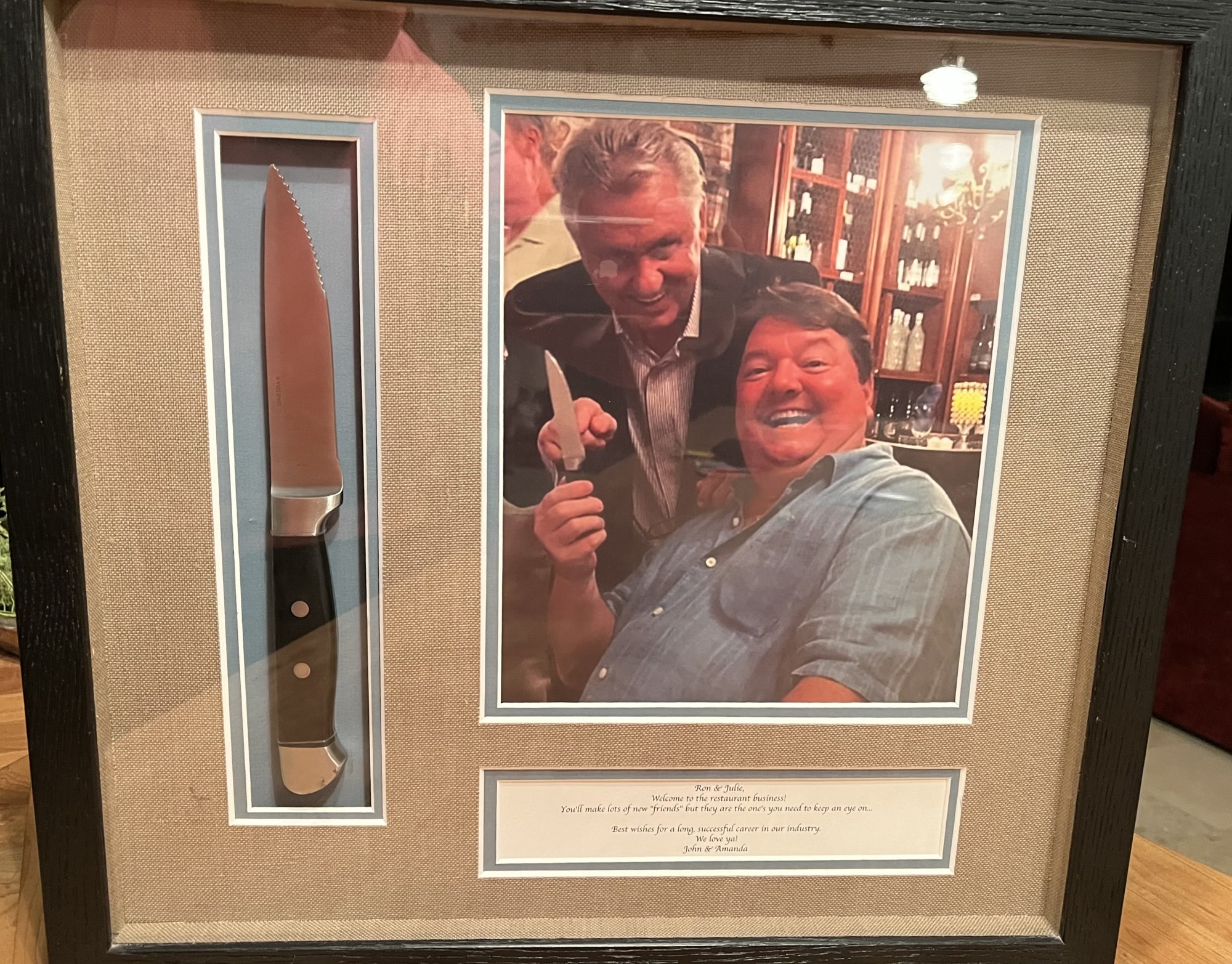 Ron Milton (left) and John Horne (right) met in 2016 when the Miltons took over ownership of Cafe L'Europe. Horne collects knives and returned this one in a shadow-box frame. Submitted