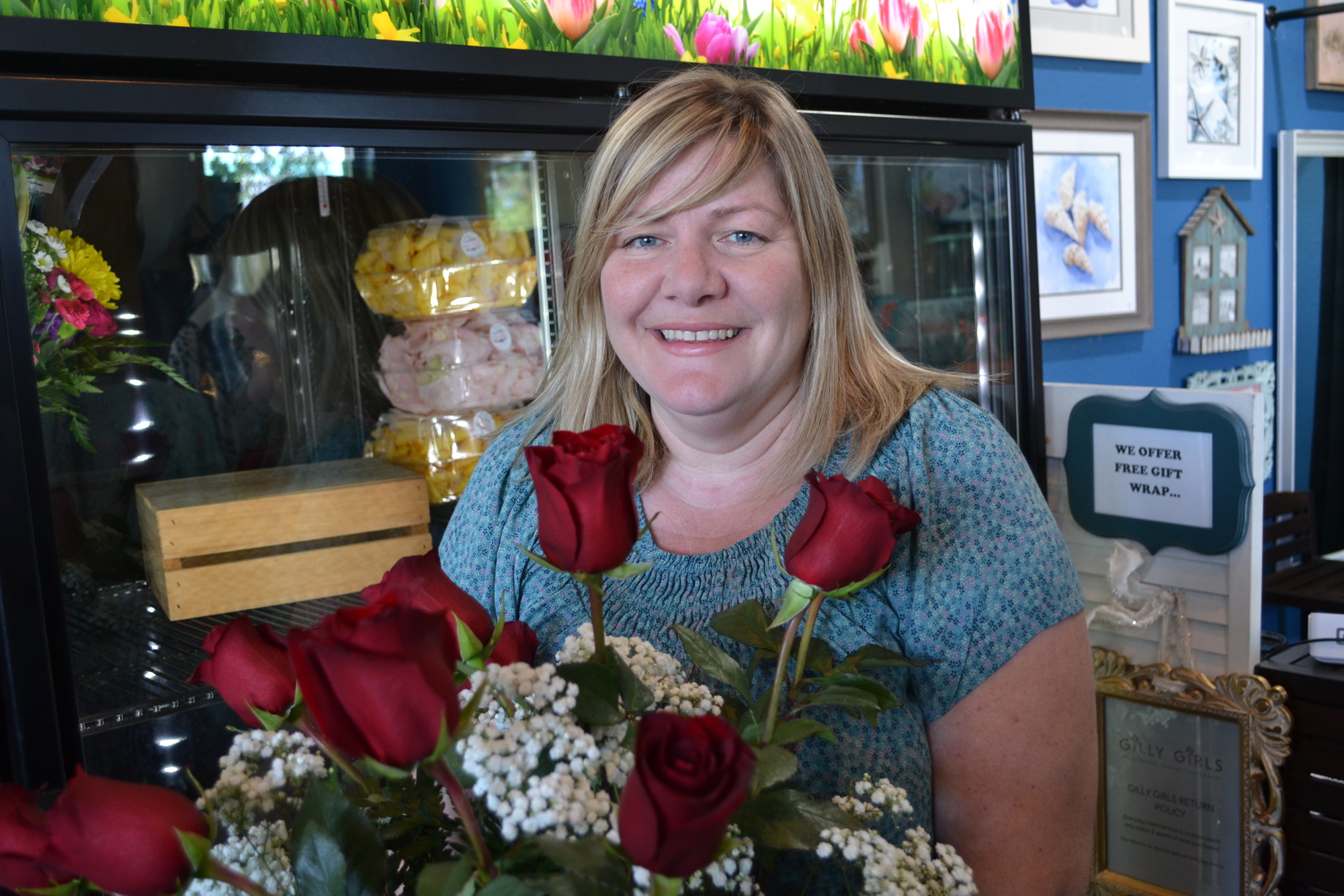 Michelle Bridges had trouble renting a refrigeration unit, so she built a new unit at her store.