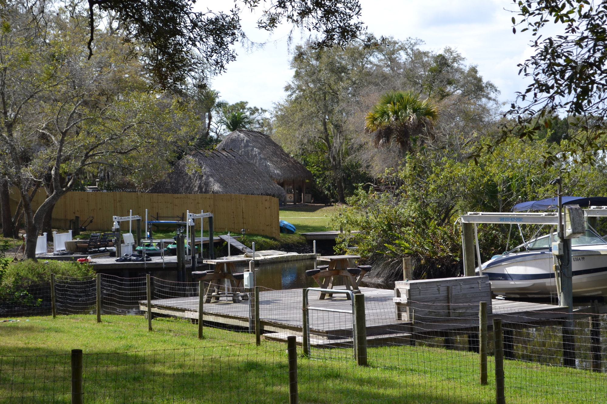 The tiki huts and decks in the backyard area of the short-term rental home on Mill Creek Road are often filled with fun-loving guests.