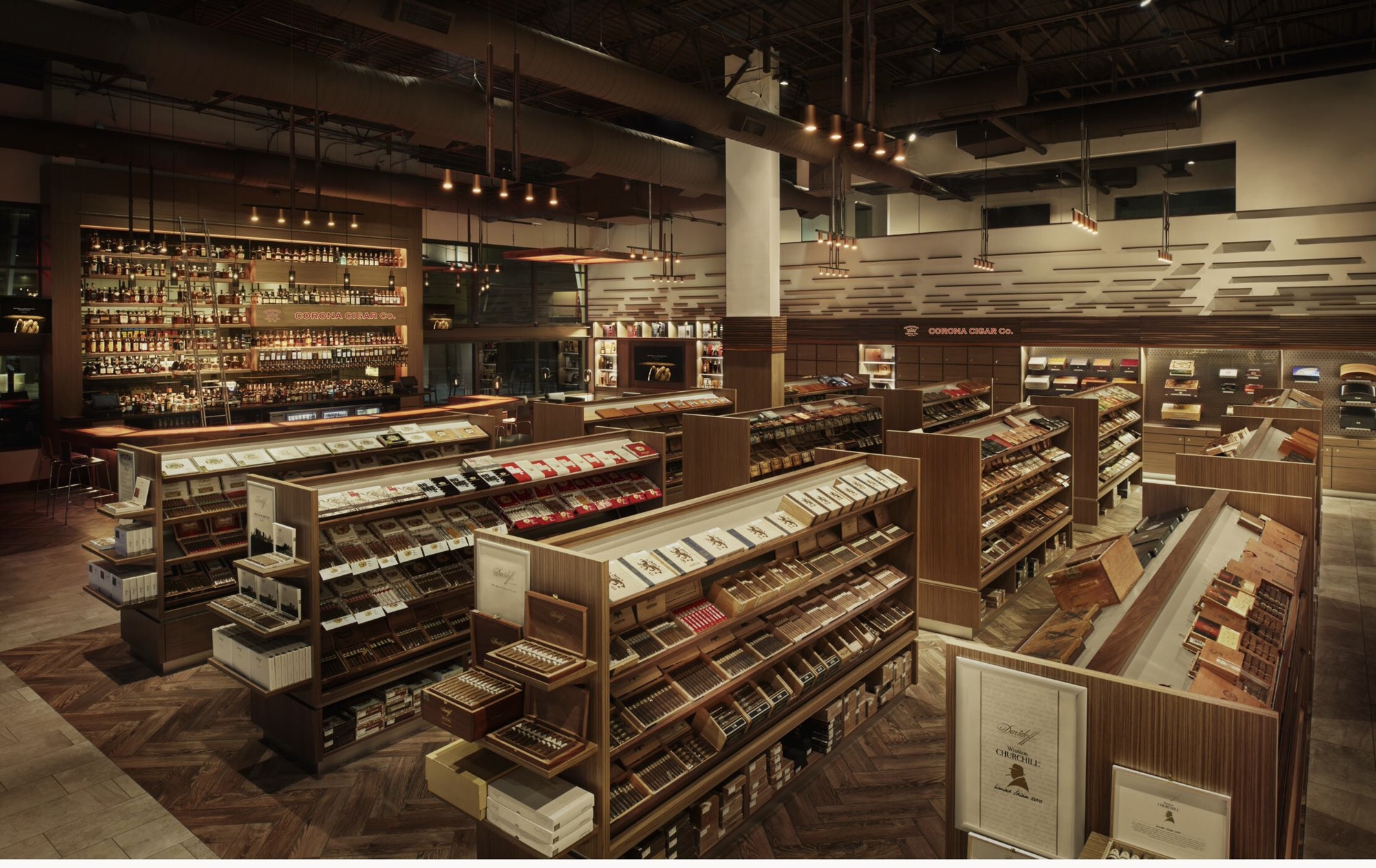 Jeff Borysiewicz said his shops derive the majority of their revenue from retail sales, but the presence of a bar and late-night hours drew concern from some downtown residents. (Image courtesy Corona Cigar Co.)