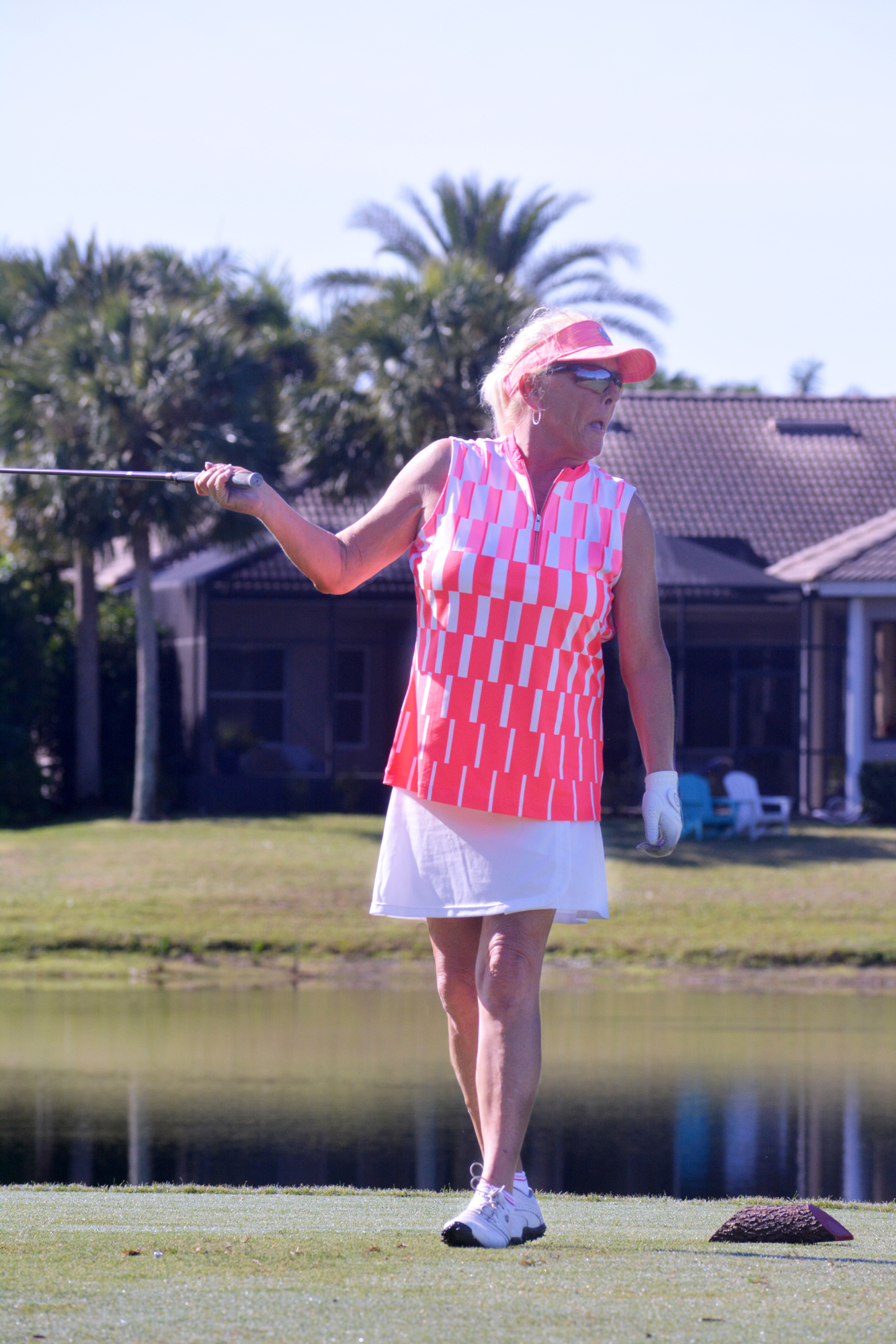 Barb Shaw tried to force her tee shot on the No. 5 hole to veer right, but to no avail.