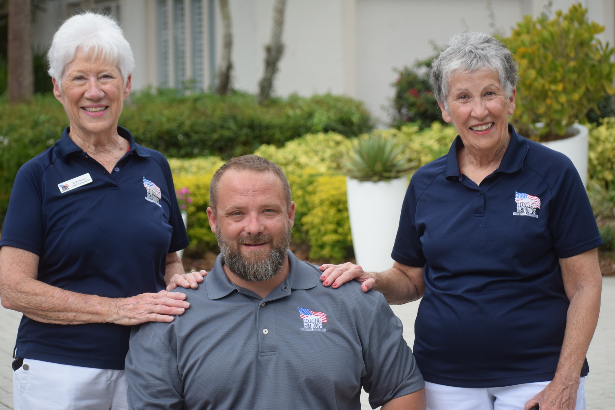 Kathi Skelton and Deb Kehoe say the Rosedale Golf Classic and its affiliated events will donate more than $175,000 to Homes for Our Troops. Army Sergeant Chad Rozanski (center) was the main recipient of this year's event.