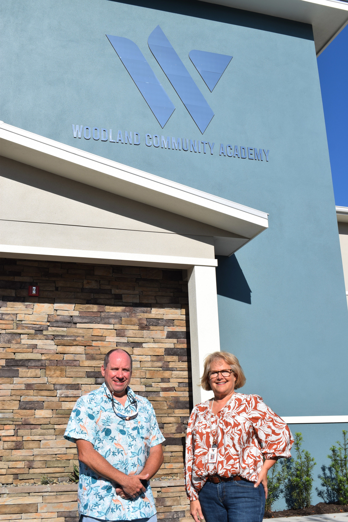 Dewayne McFarlin, the executive pastor of Woodland Community Church, and Jennifer Passmore, the director of Woodland Community Academy, are thrilled to have the middle school facility complete after delays due to the pandemic.