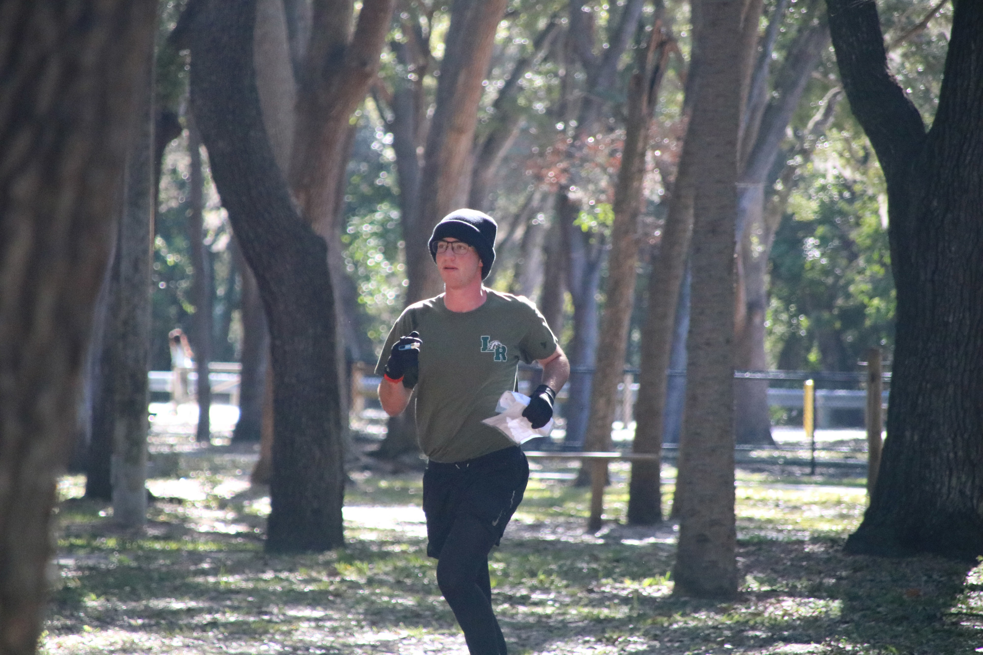 Senior Reed Smith runs through an orienteering course. Courtesy photo.