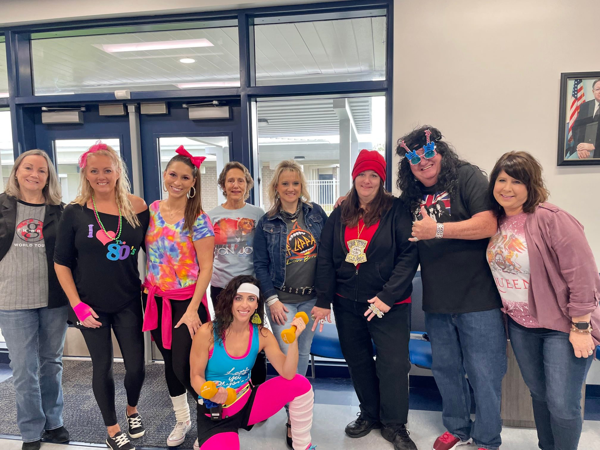 David Marshall, the principal of Gene Witt Elementary, (second to the right) dresses up for a spirit day with teachers and staff. Courtesy photo.