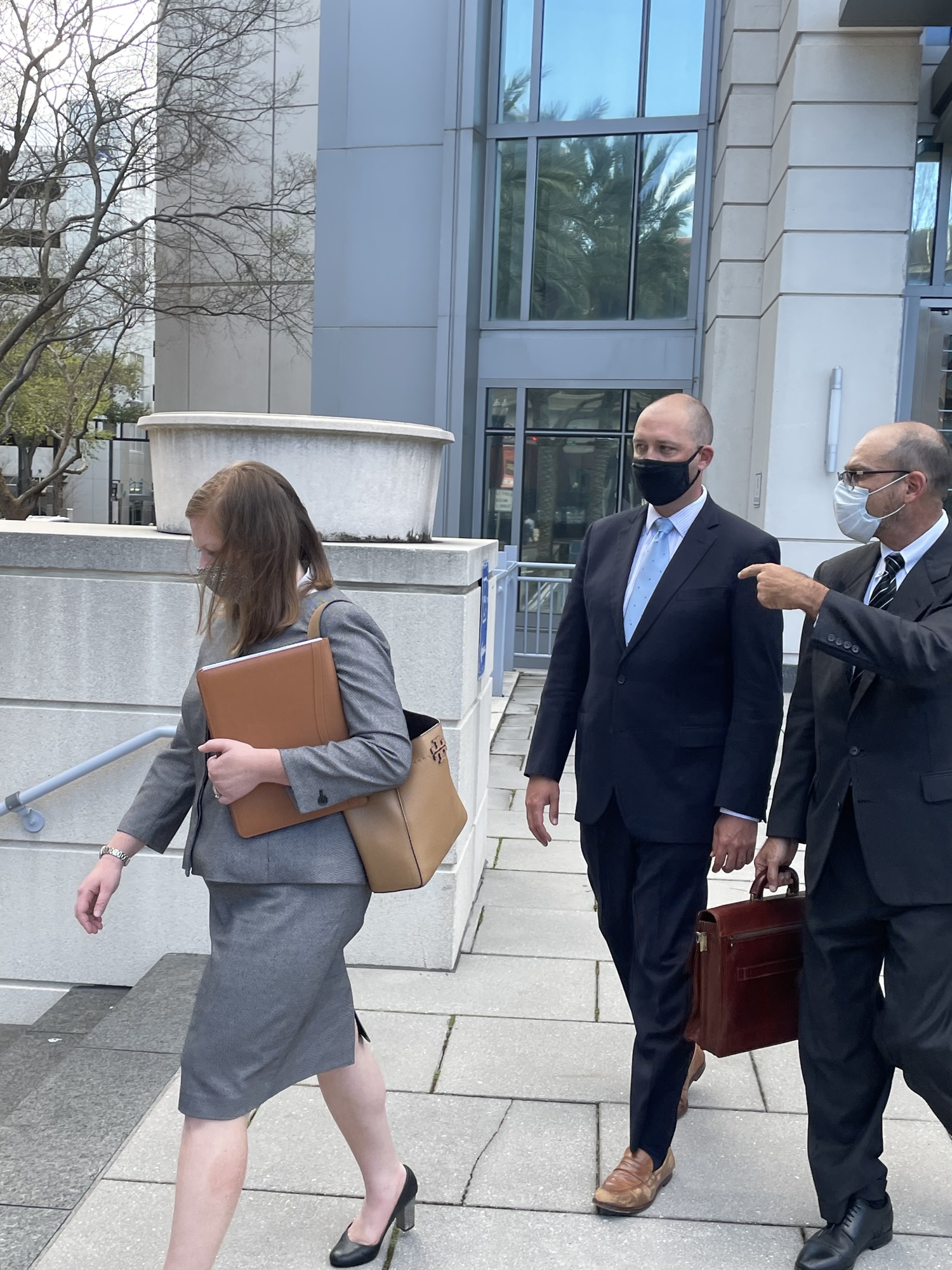 Indicted former JEA Chief Financial Officer Ryan Wannemacher leaves the federal courthouse after pleading not guilty to conspiracy and fraud charges.